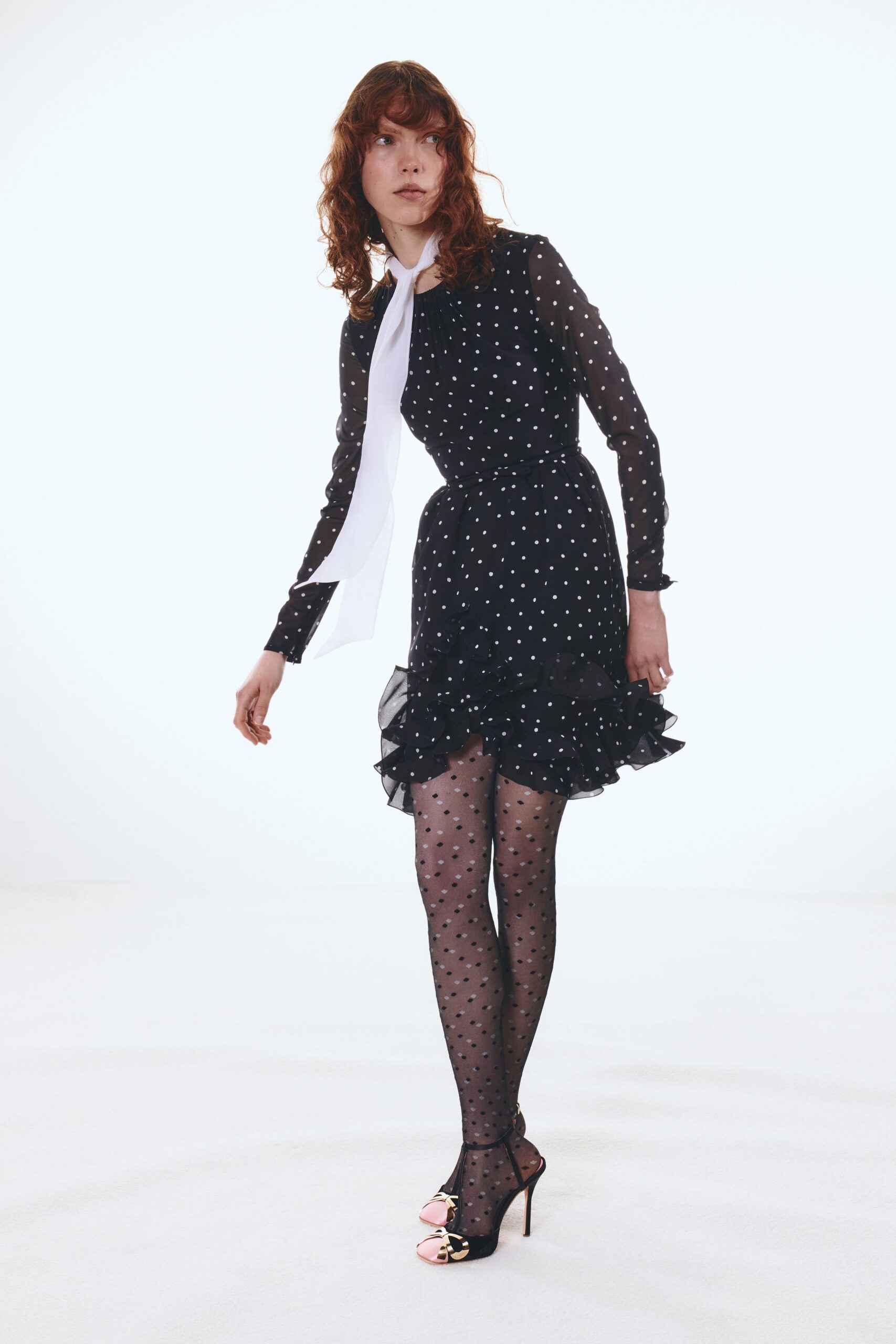 black polka-dot mini dress with collar