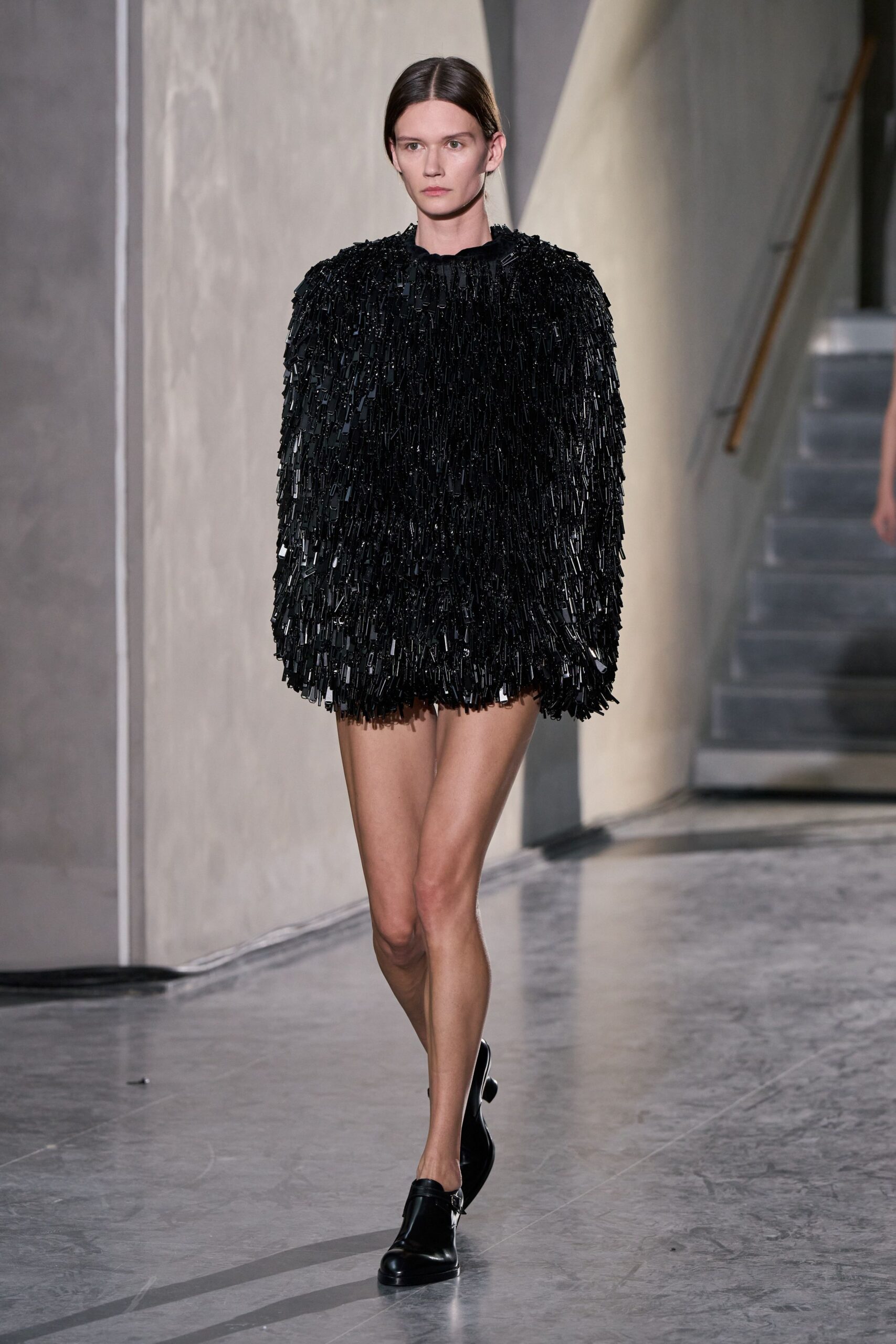 black fringed top with shorts
