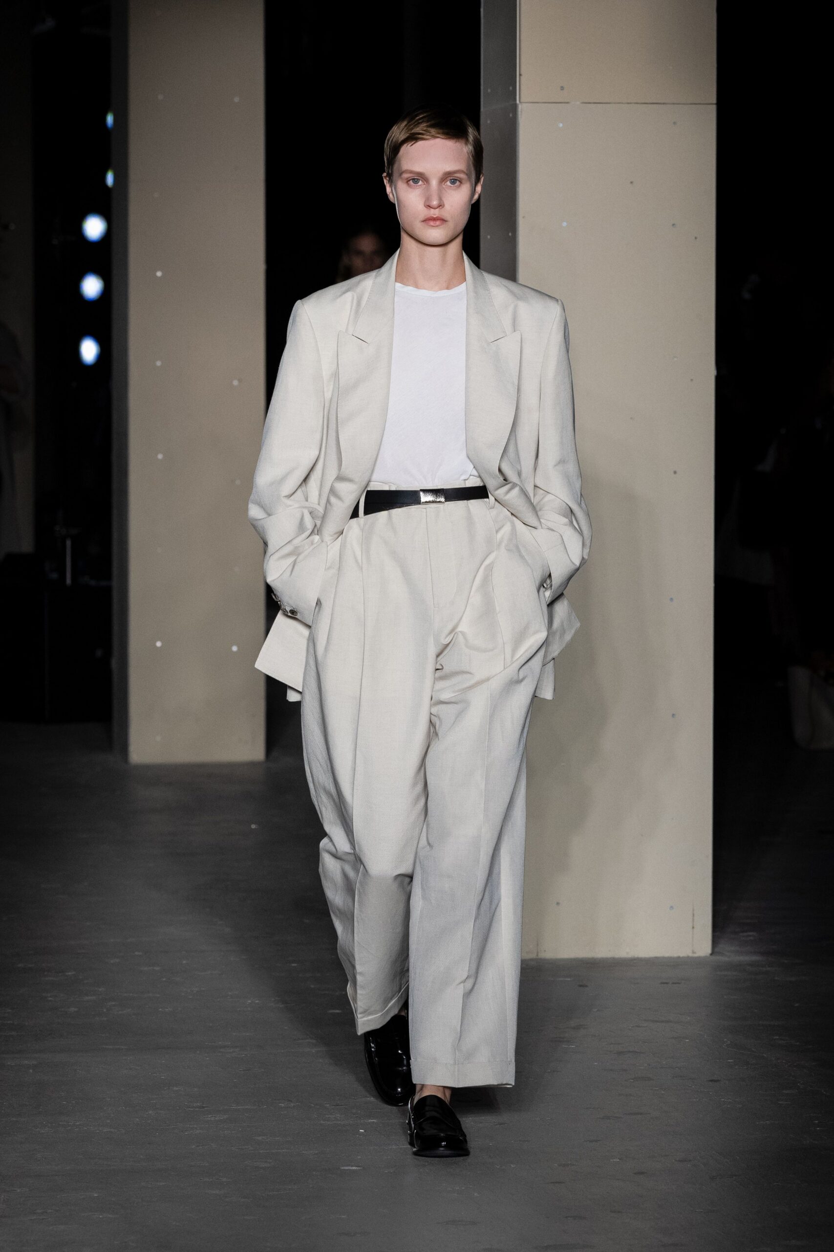 beige relaxed suit with white t-shirt