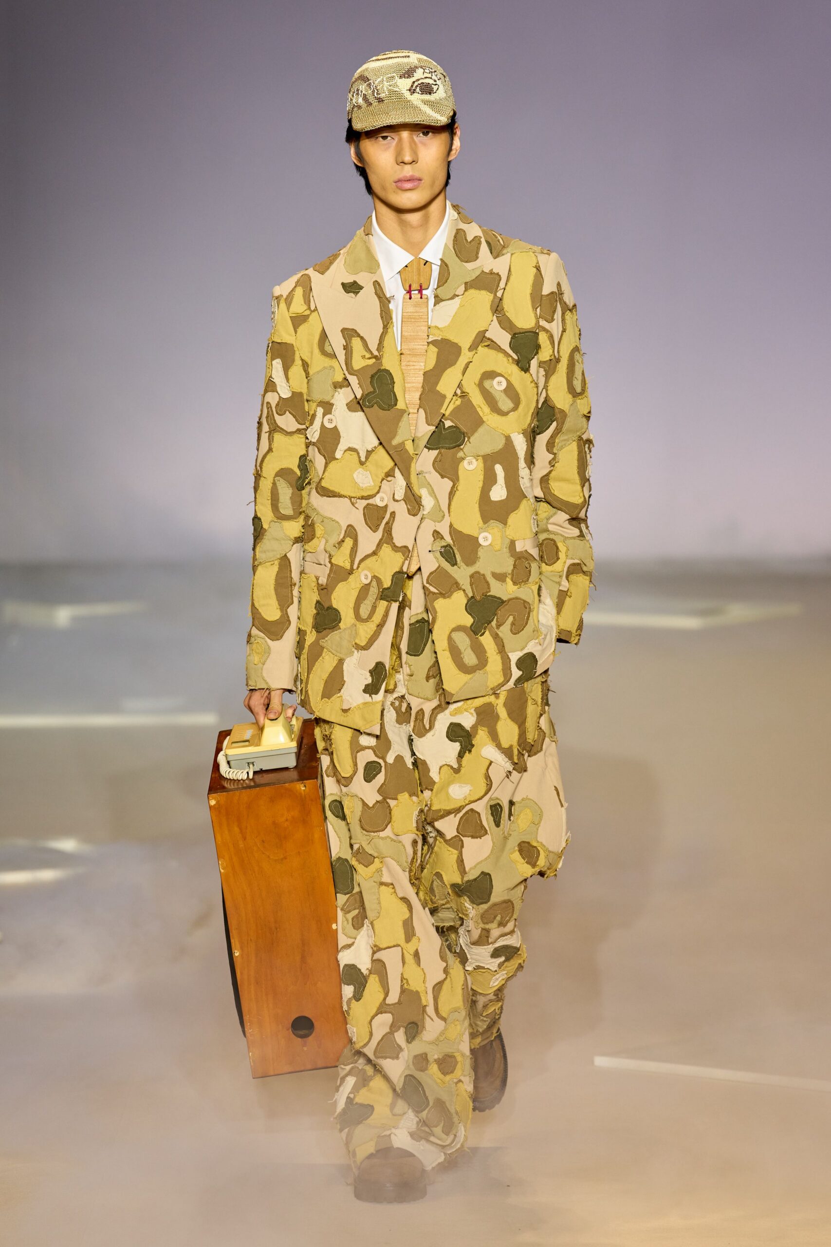 beige camouflage suit with accessories