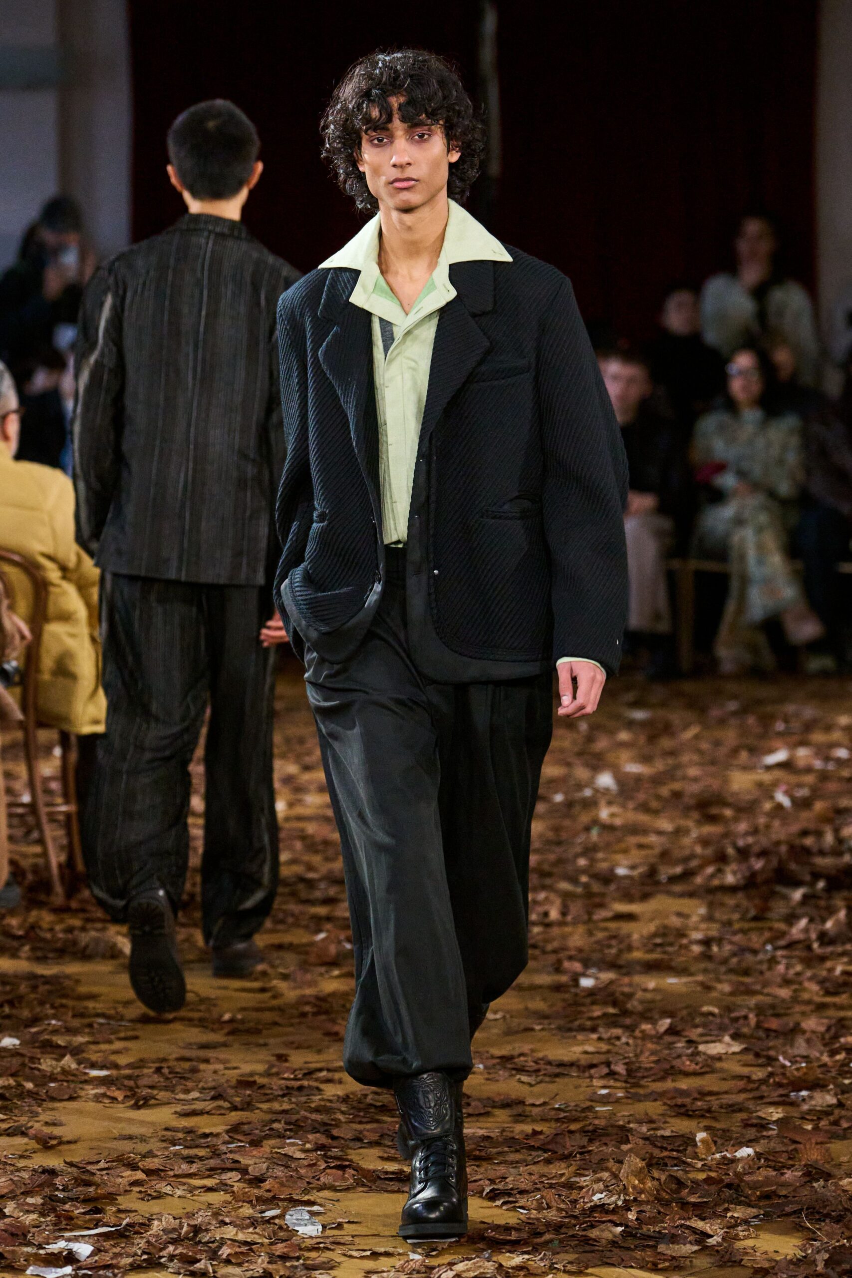 black relaxed jacket with light green shirt