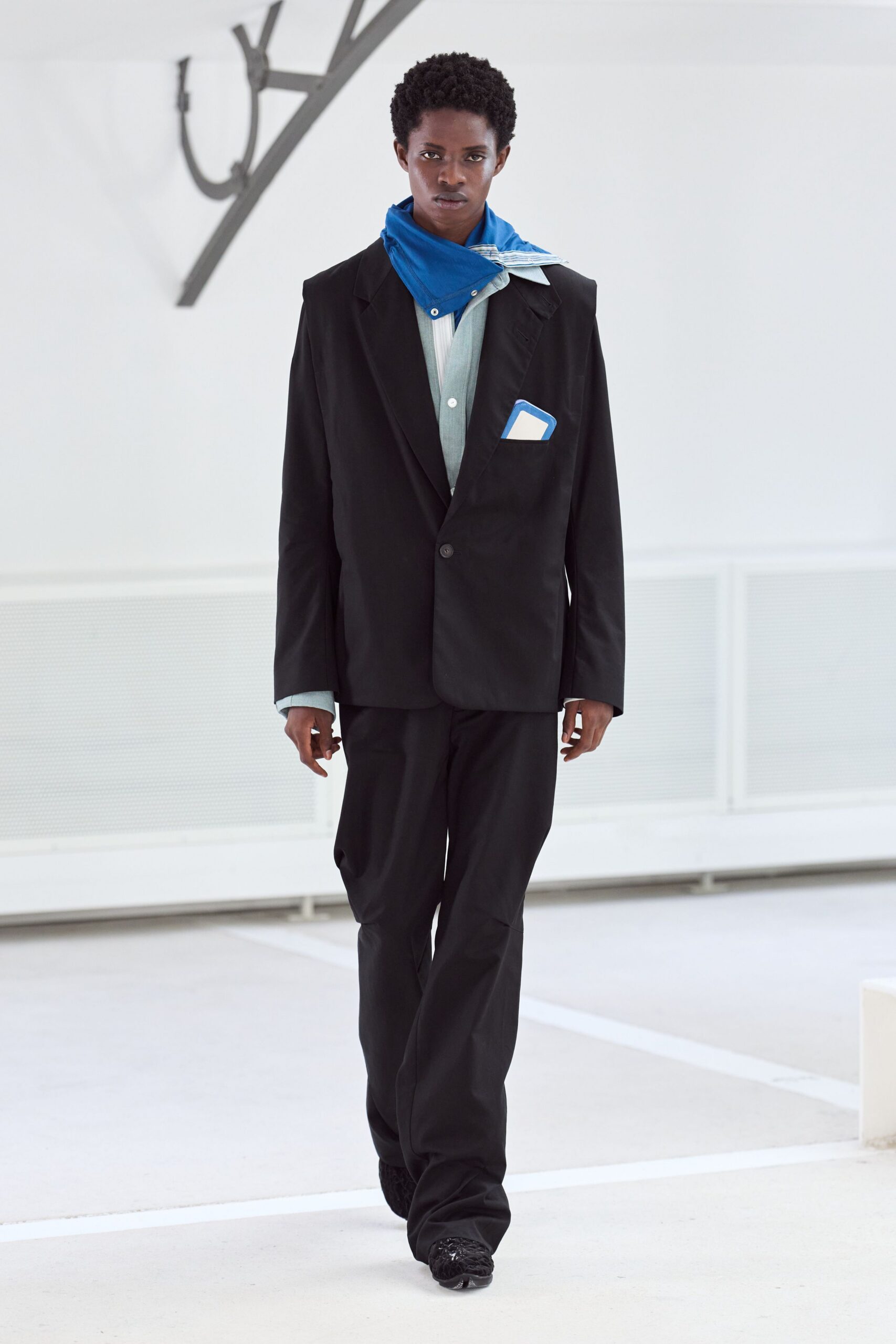 black tailored blazer with blue shirt