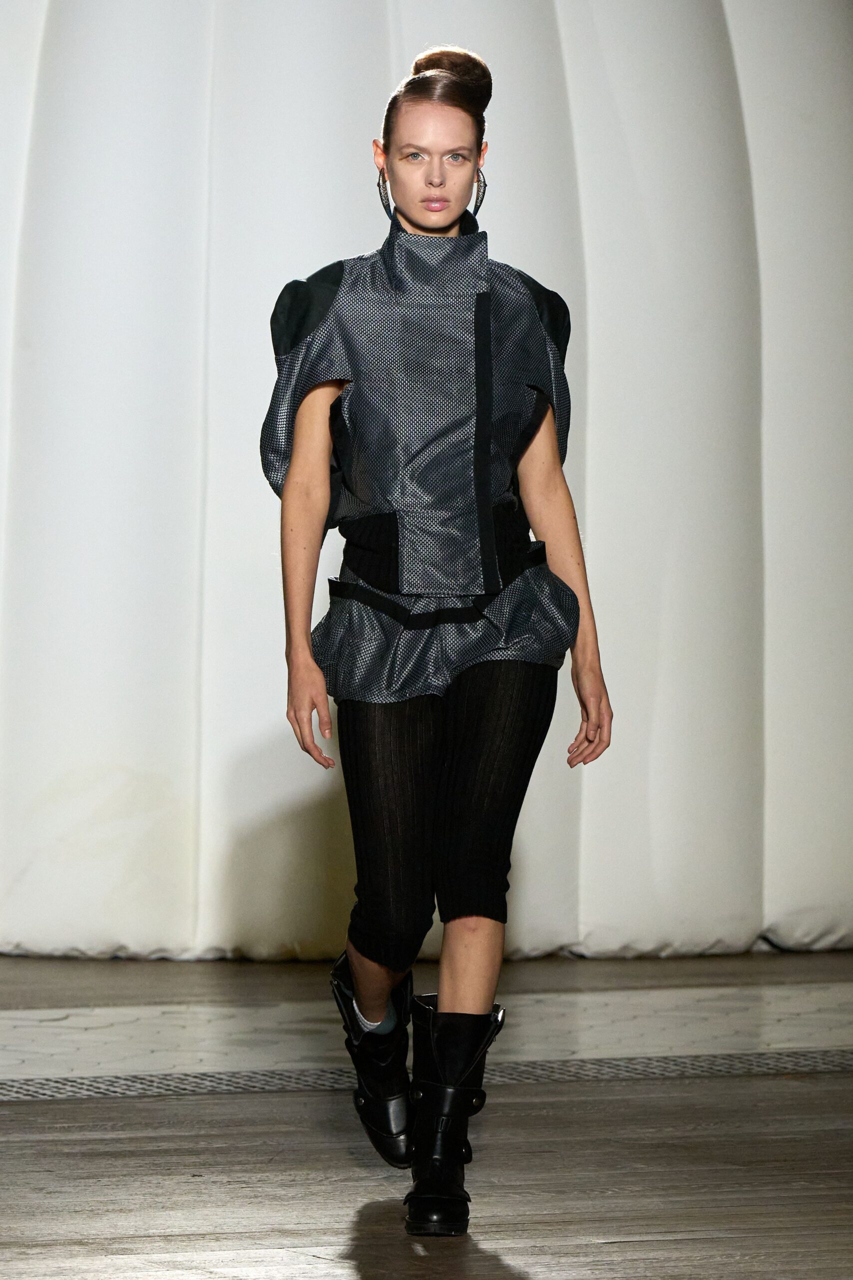 black and gray fitted top with slim pants