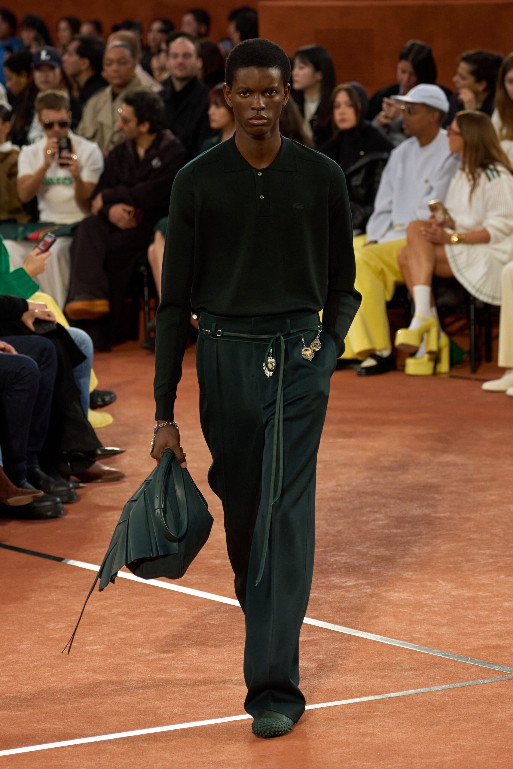 black shirt green pants