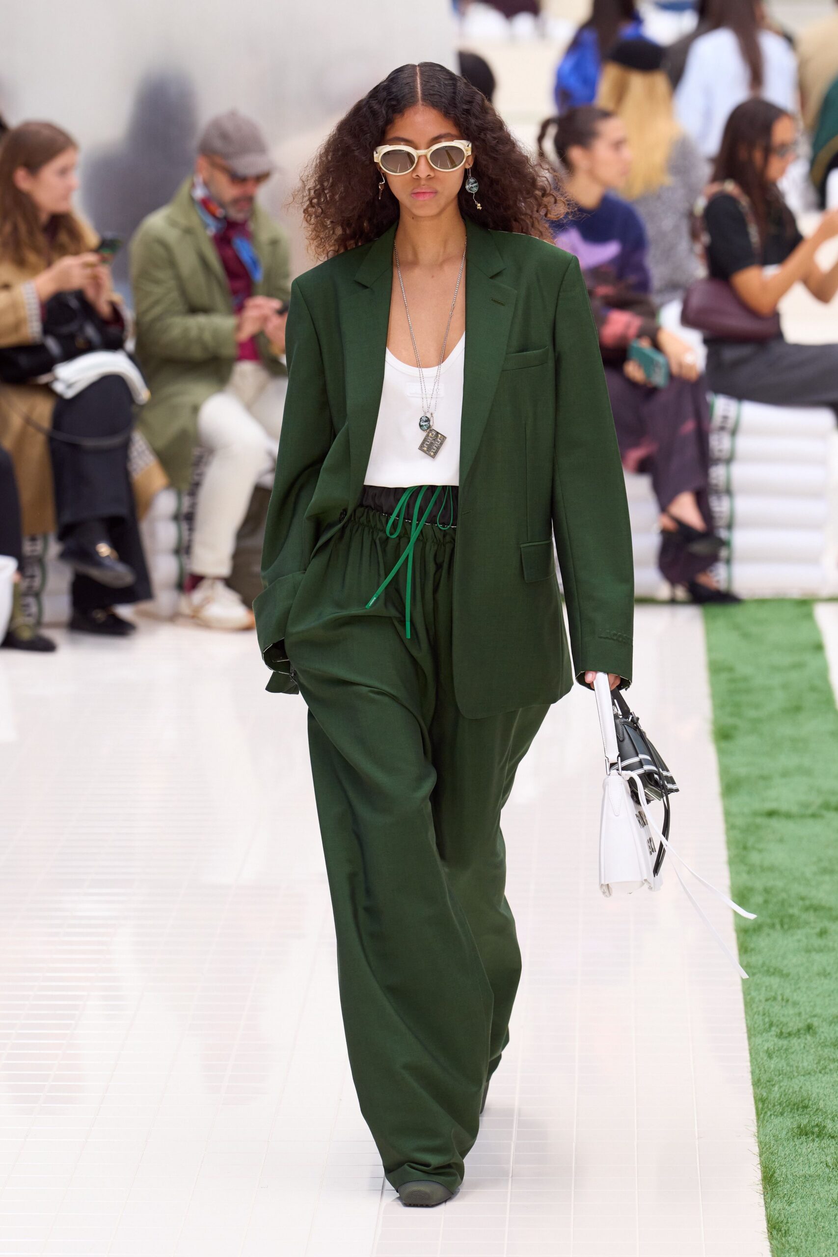 green relaxed suit with white top