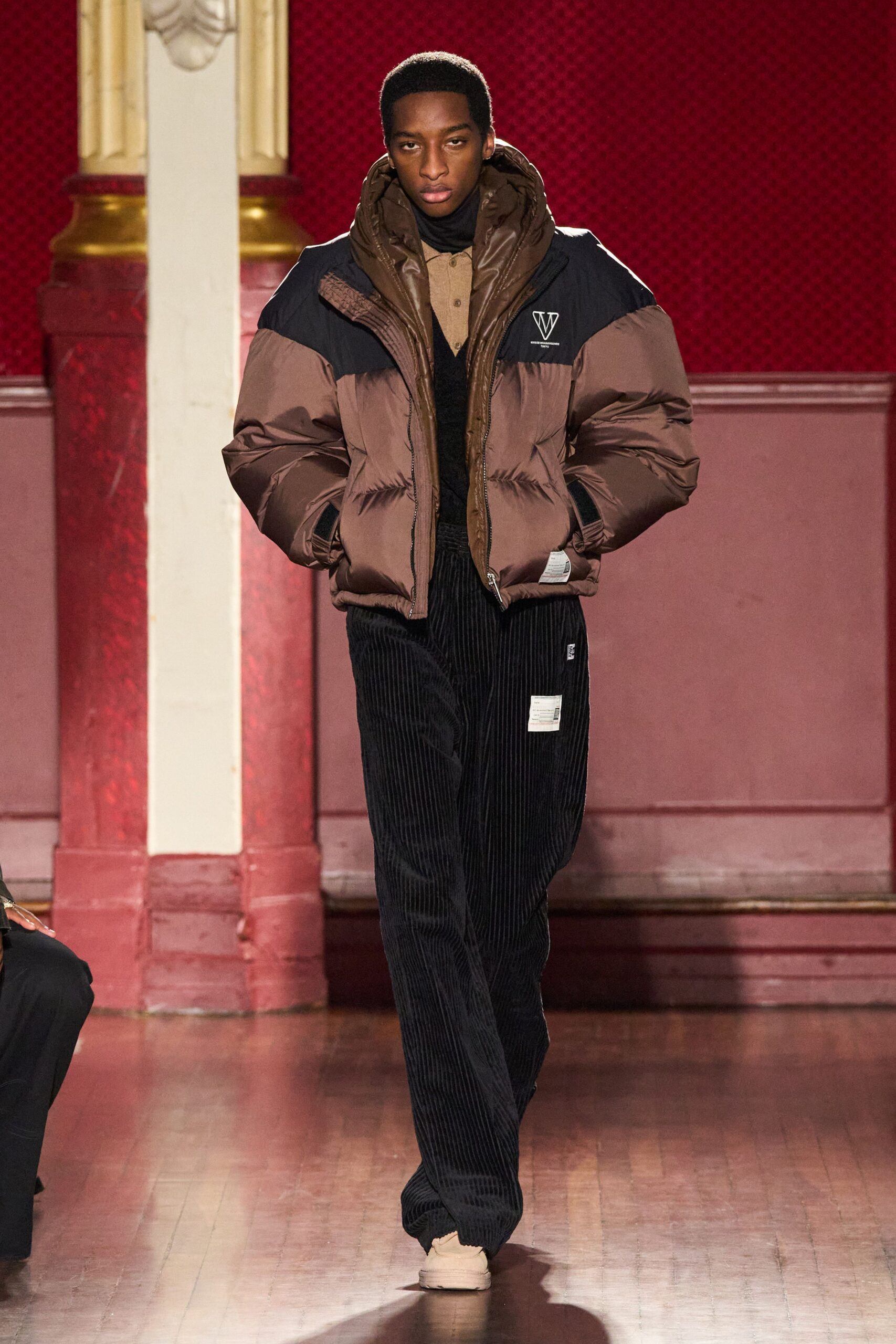 brown relaxed jacket with black pants