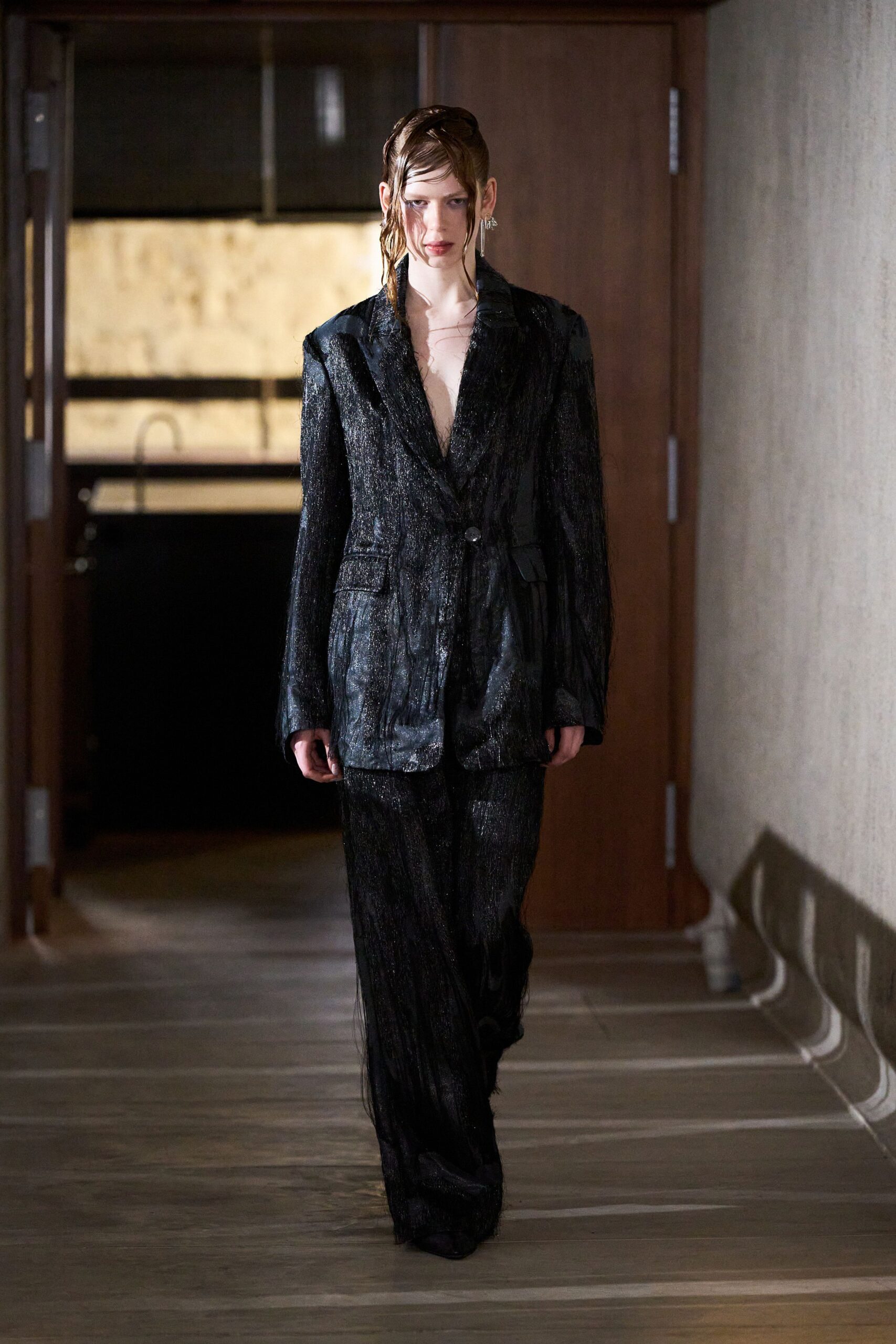 black silk structured blazer and relaxed pants