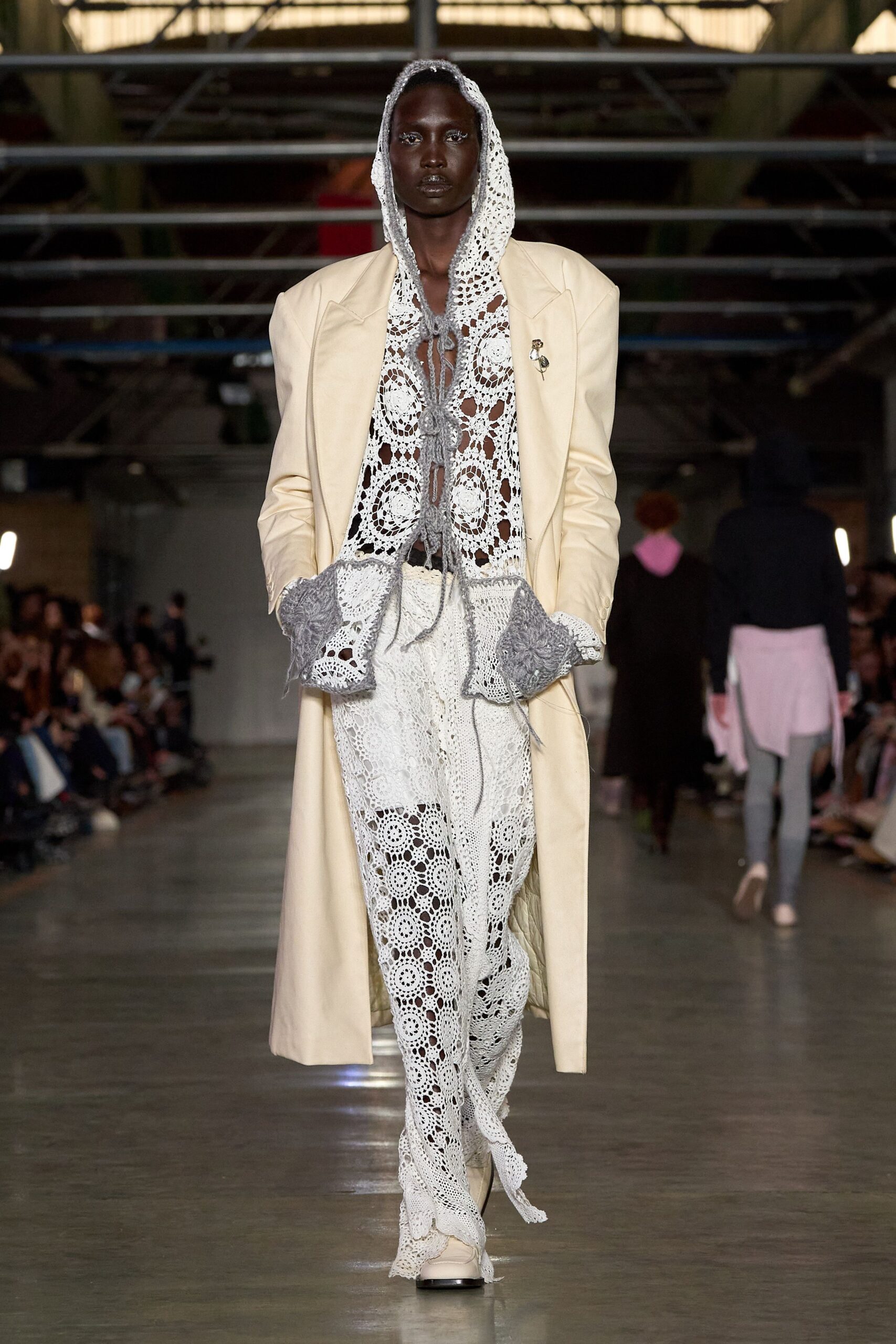 beige coat with white lace jumpsuit