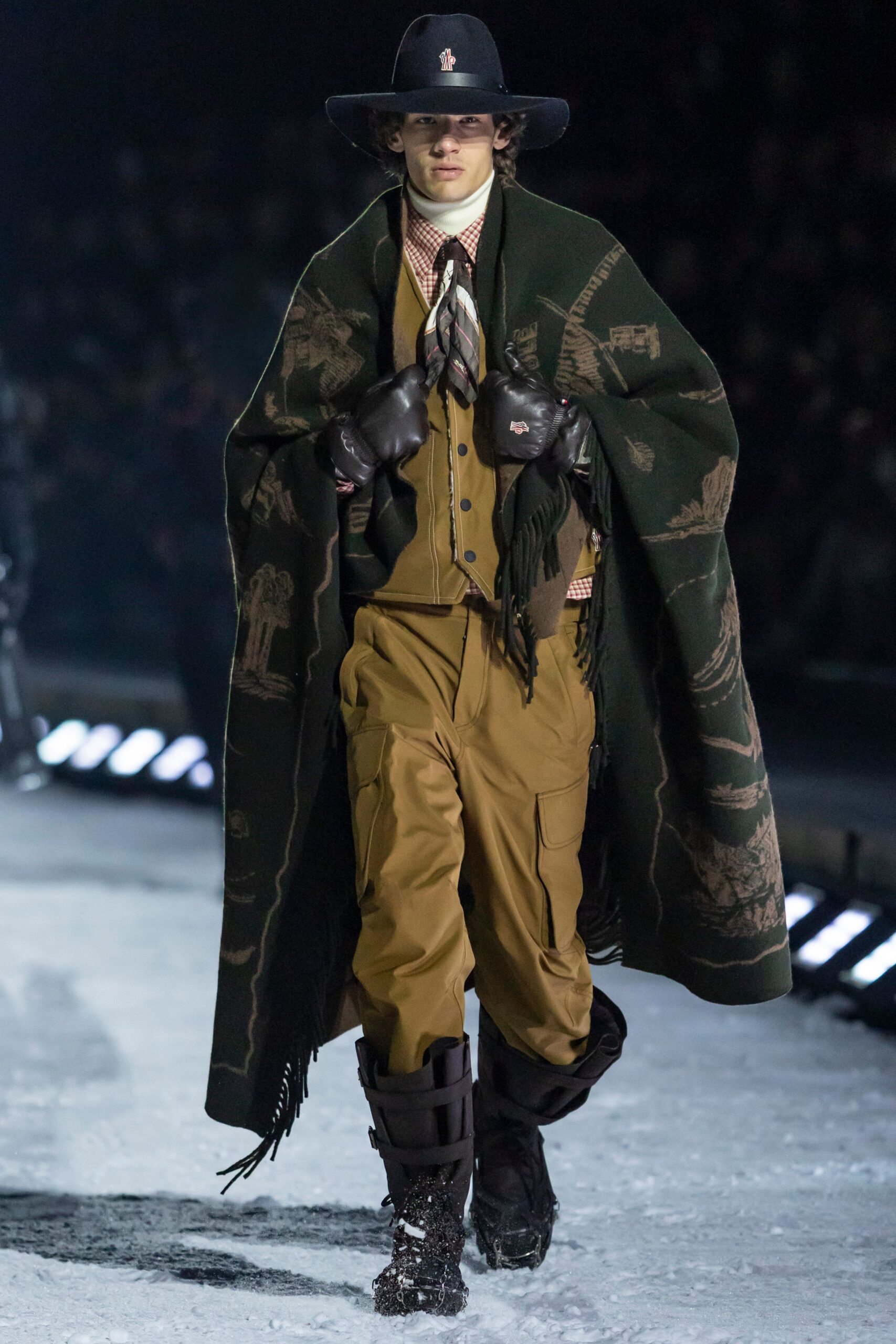green wool cape with brown pants