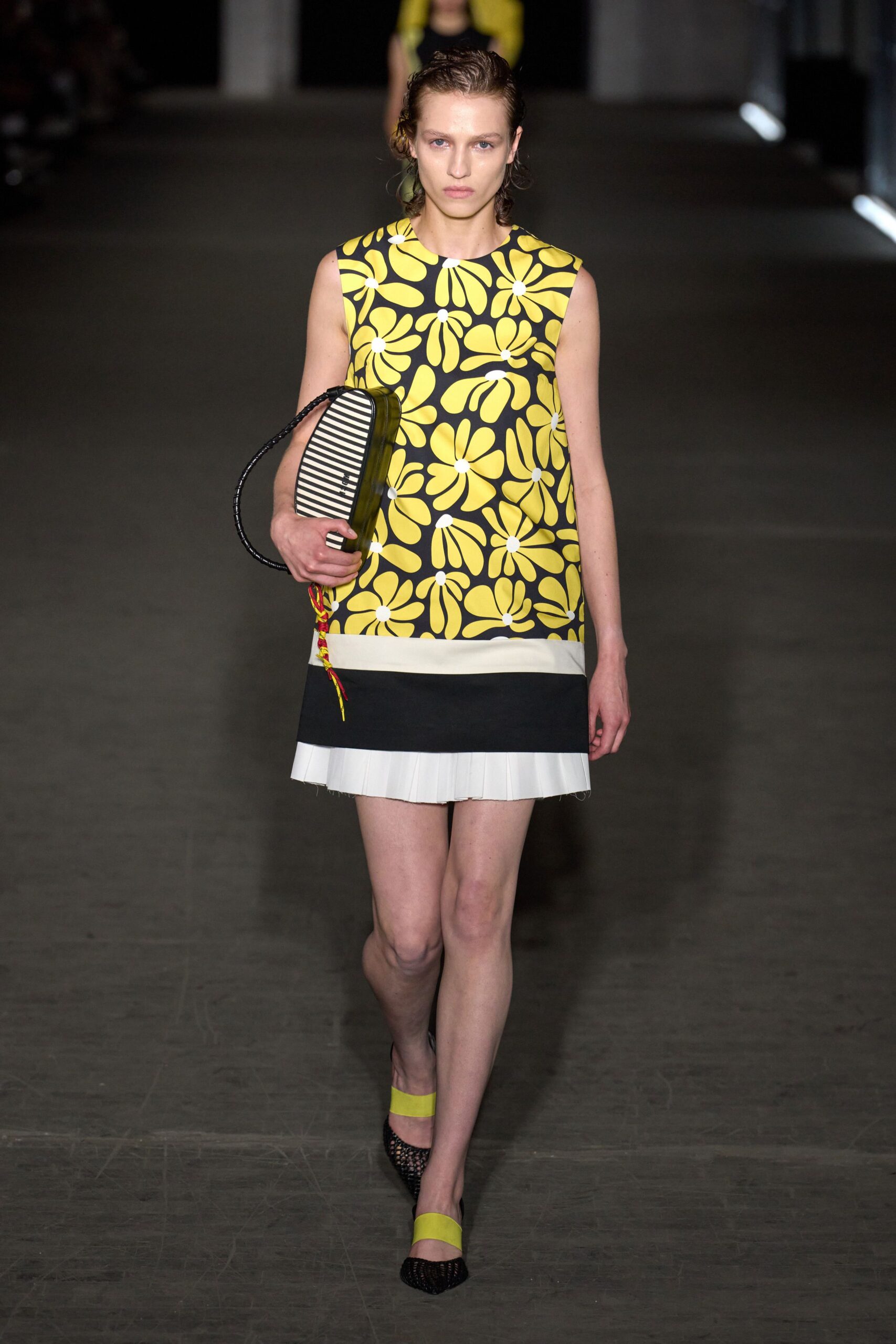yellow sleeveless high-neck fitted printed top