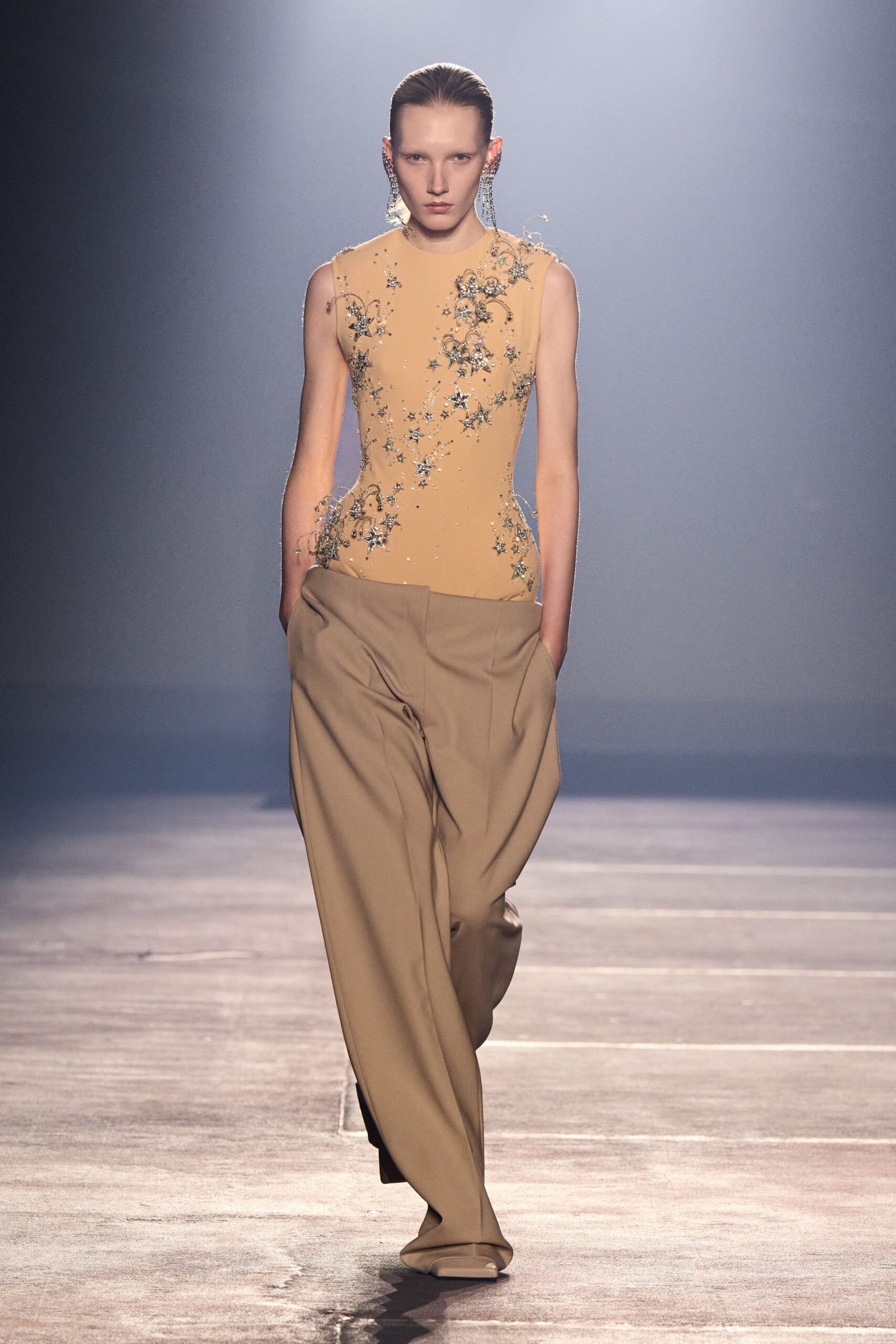 beige silk sleeveless high-neck fitted embroidered top