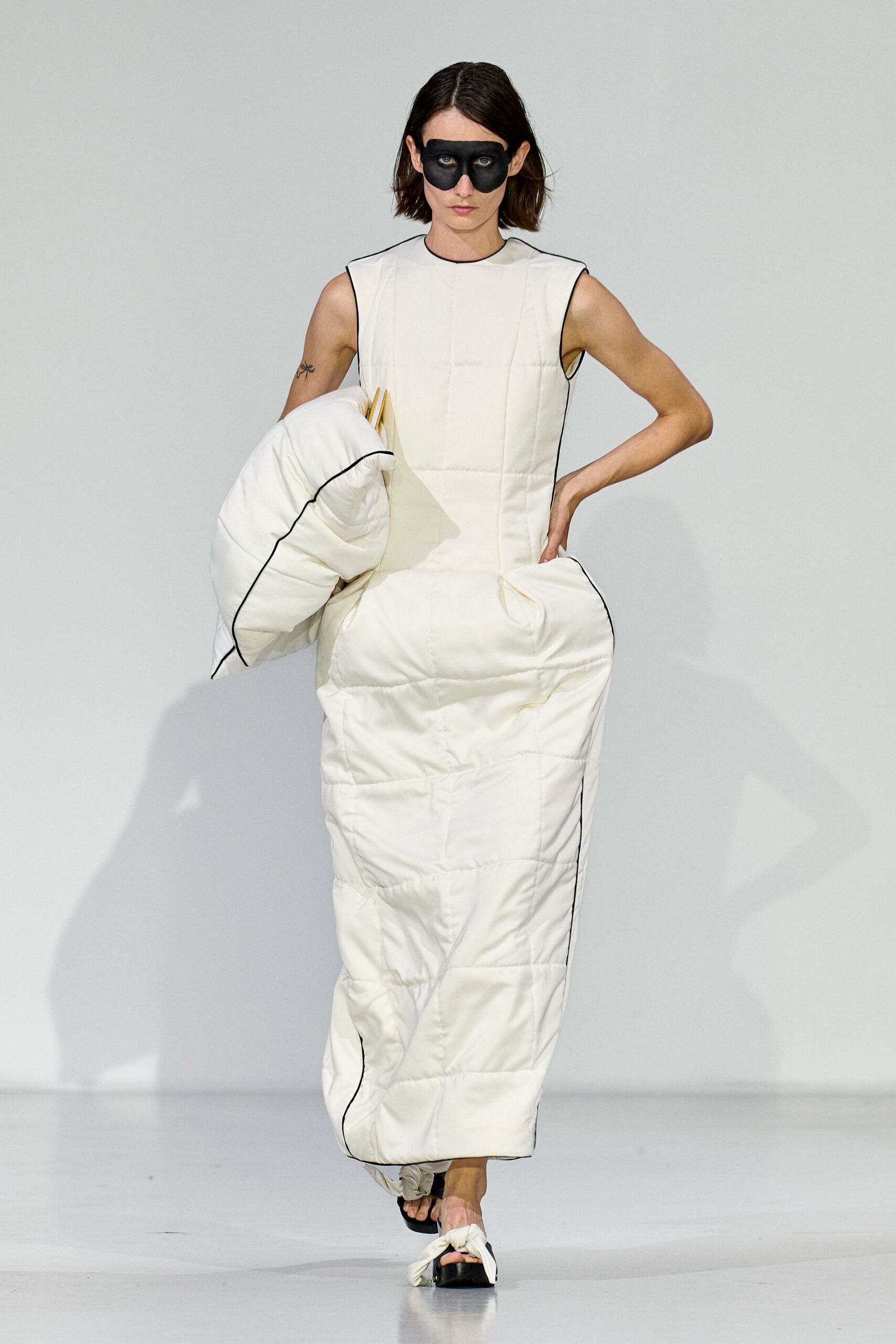 white padded gown with accessories