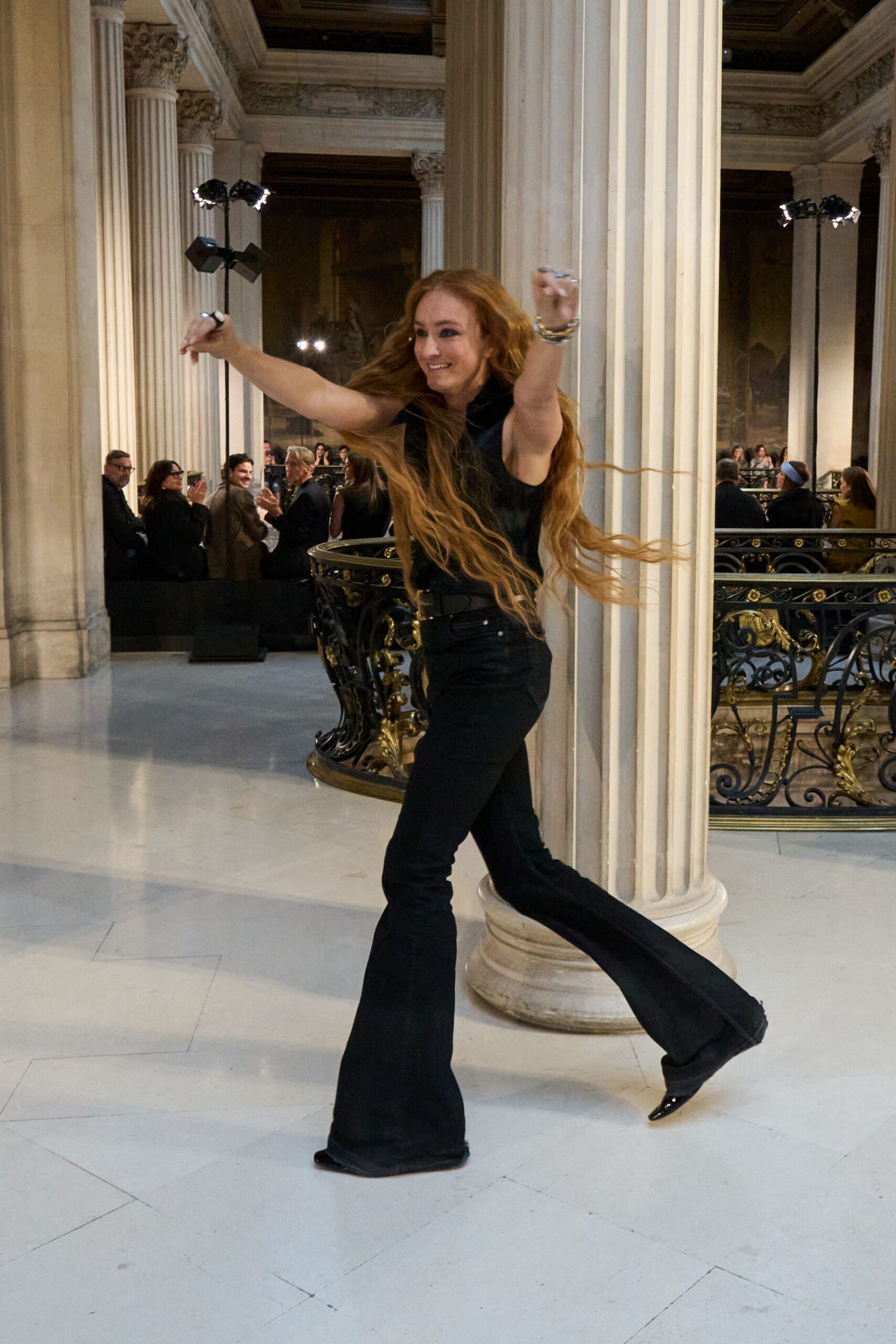 black fitted top and flared pants