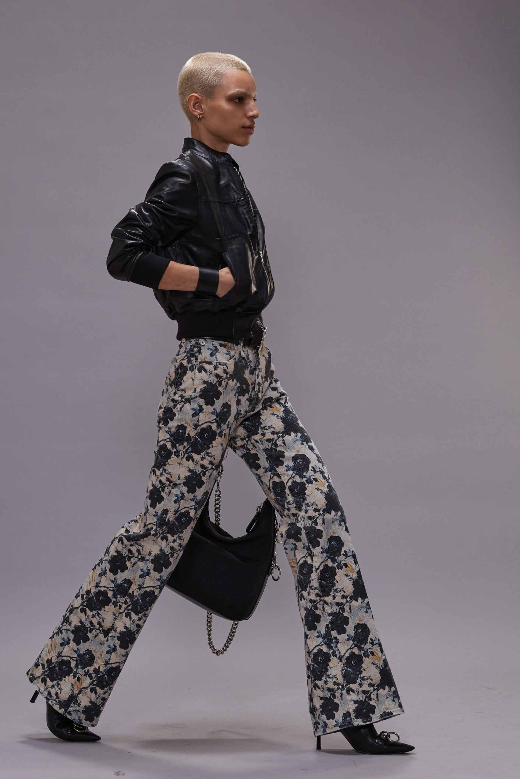 black leather jacket with floral pants