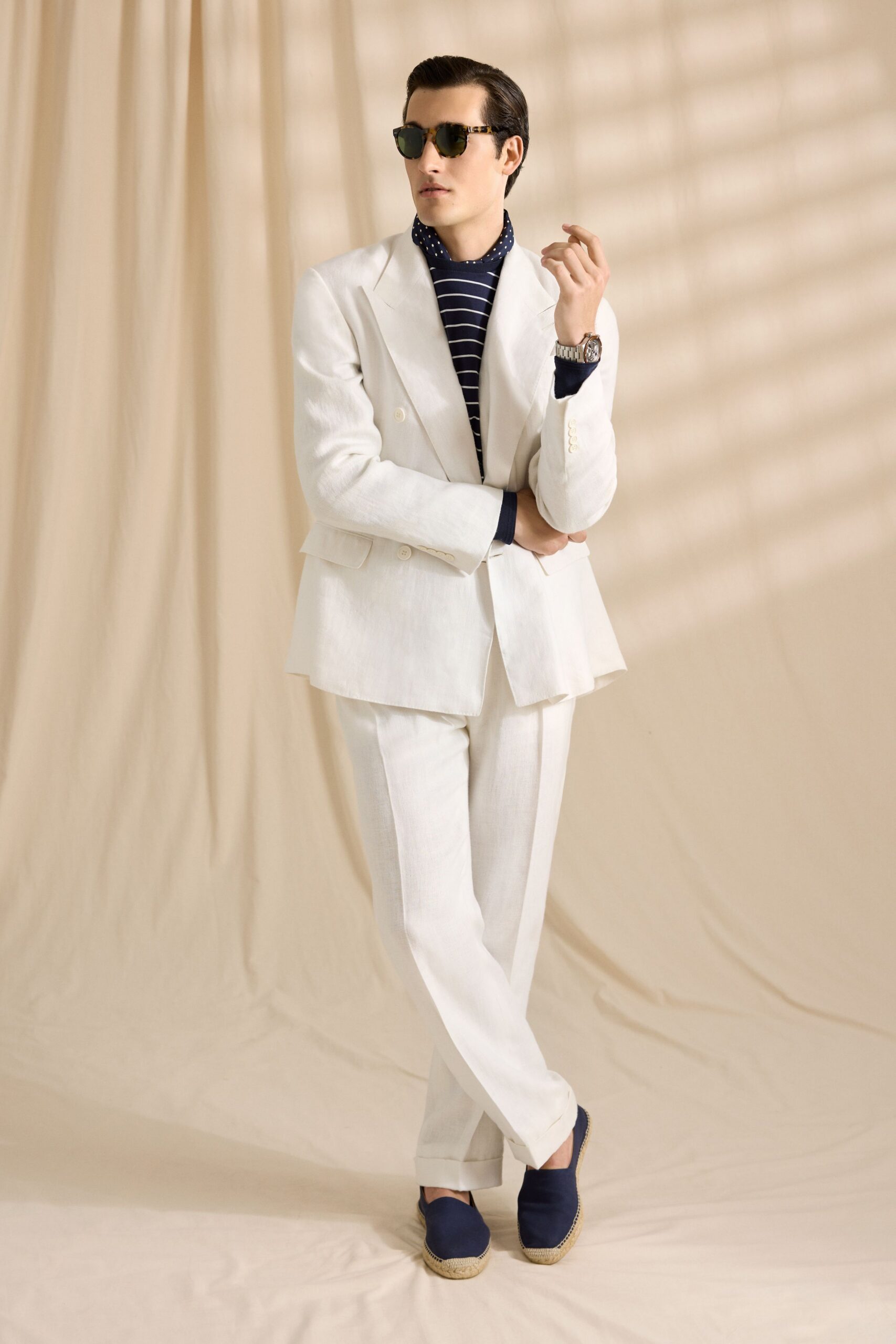 white tailored suit with striped shirt
