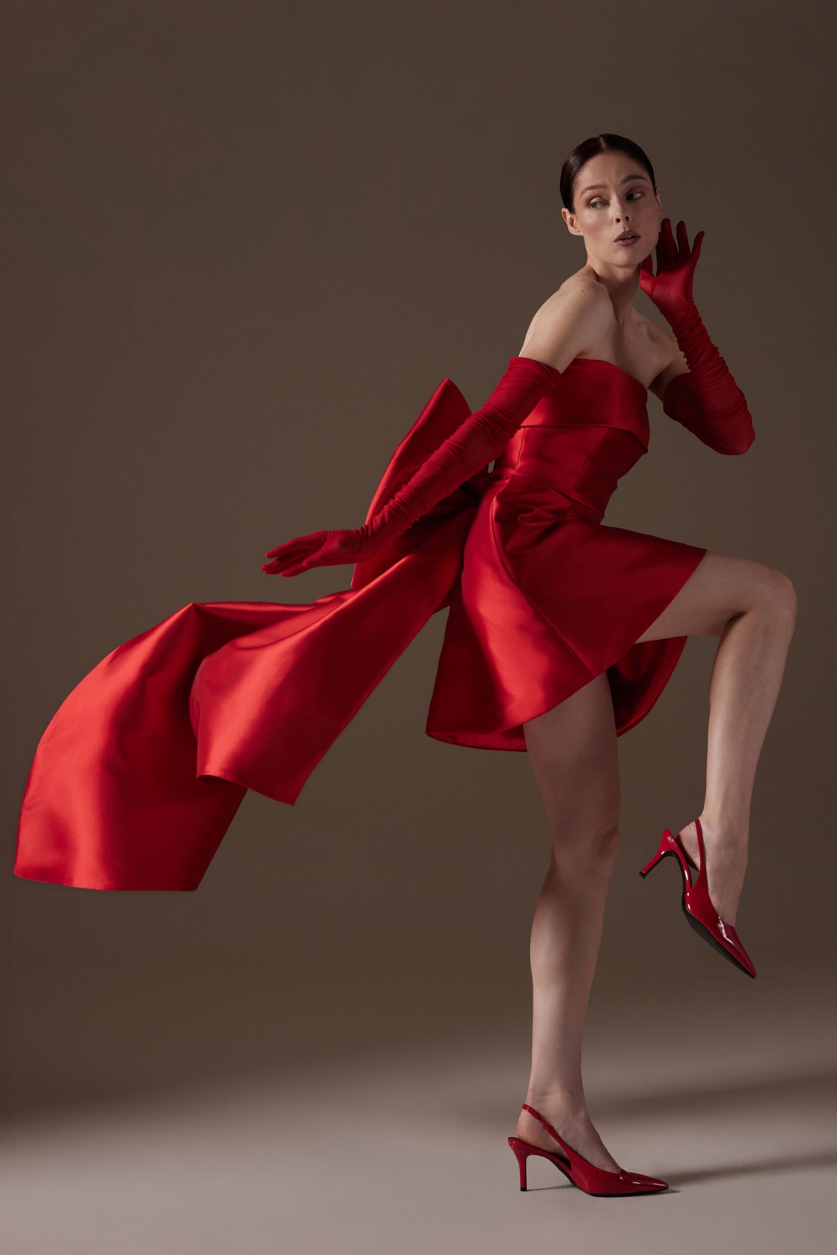 red satin strapless fitted draped flowing mini dress