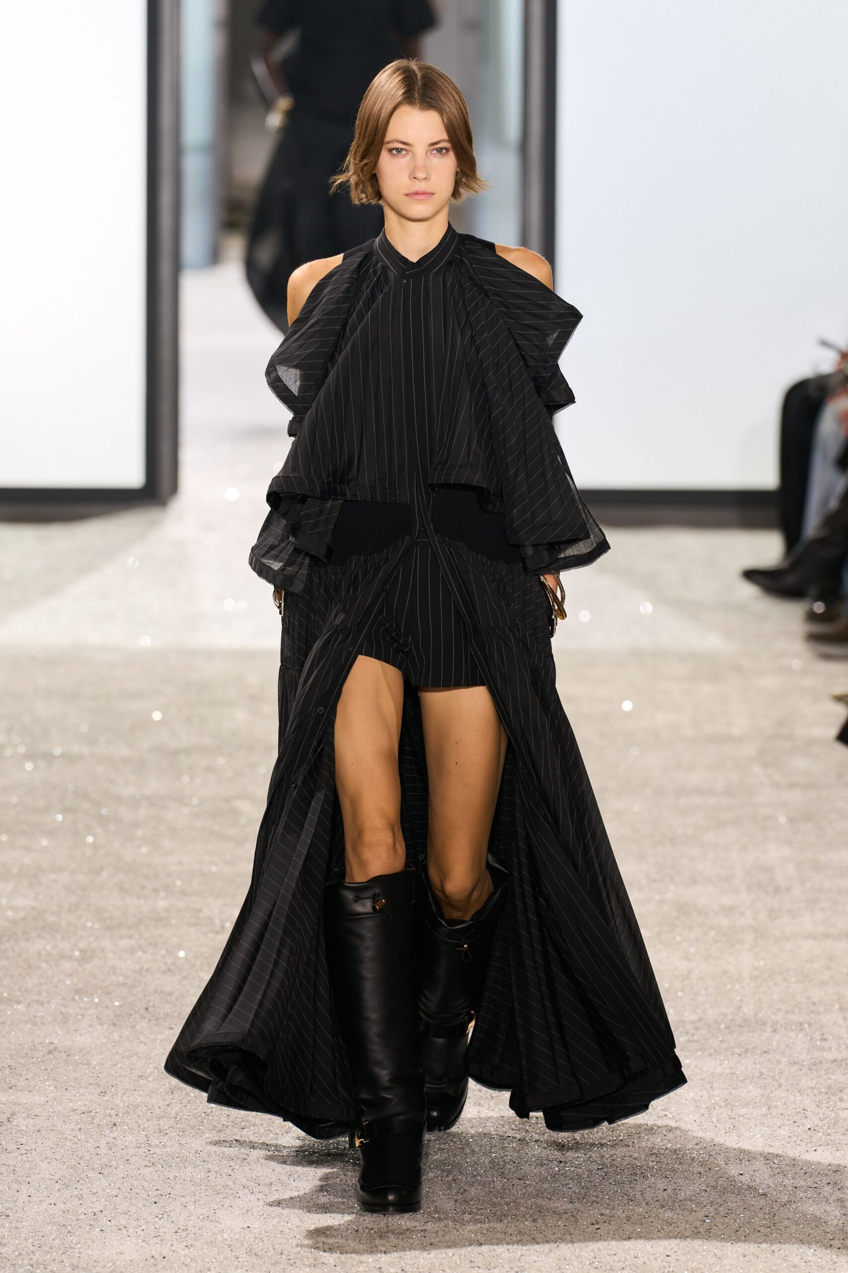 black pleated midi dress with boots