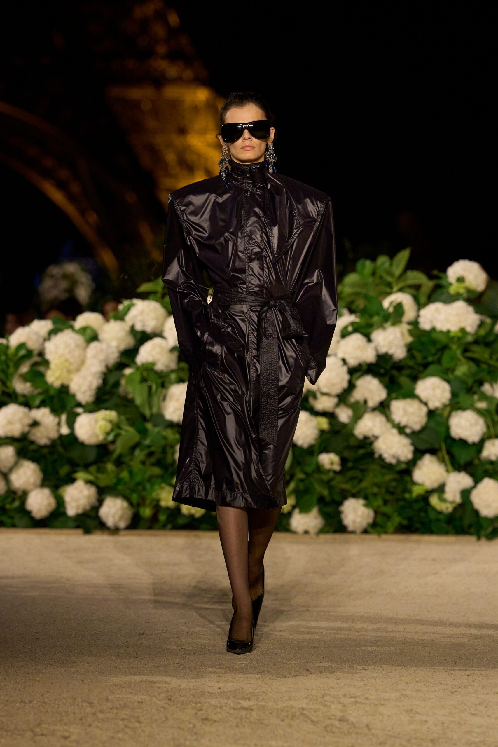 black vinyl long-sleeve collared fitted belted zippered coat