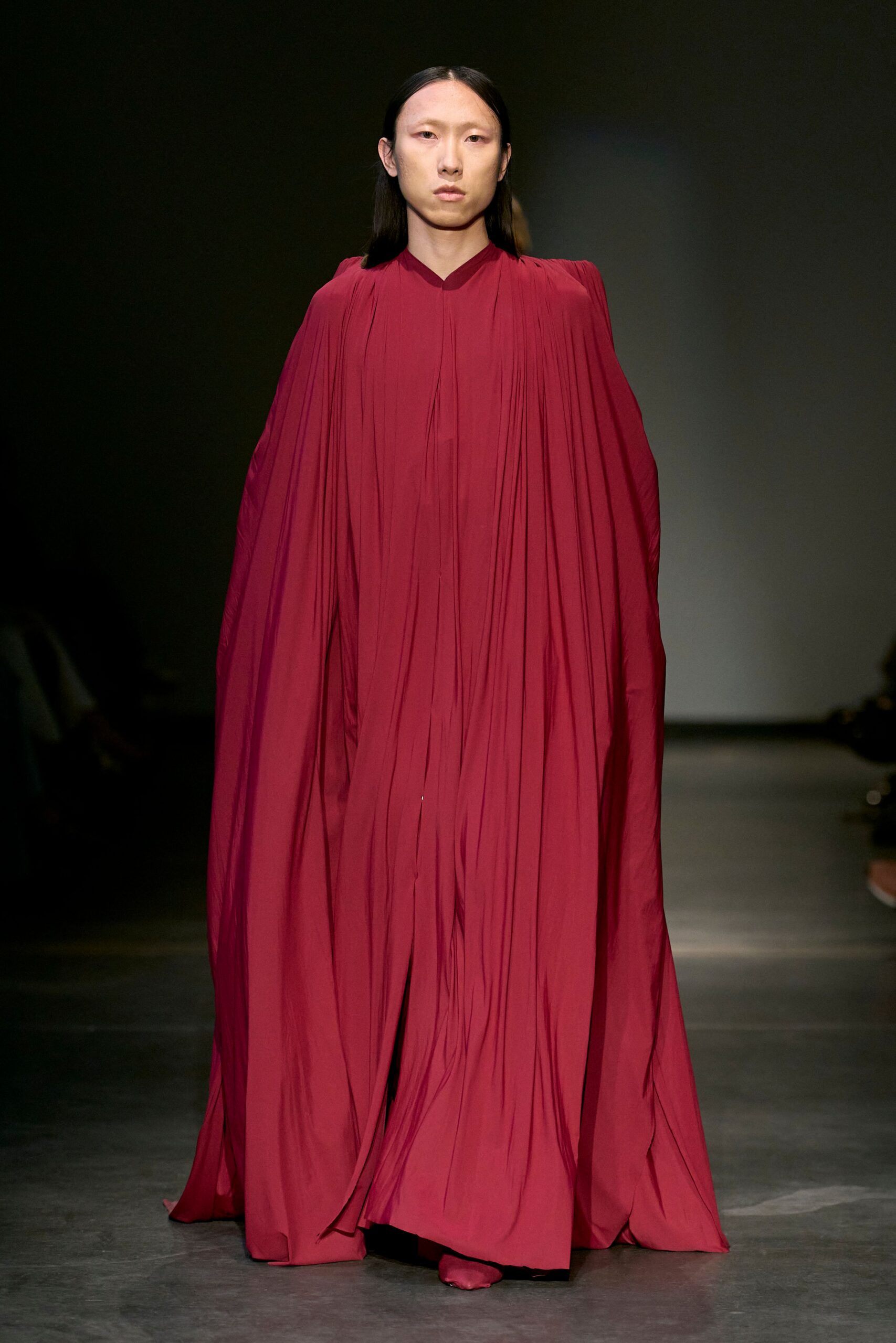red silk pleated gown