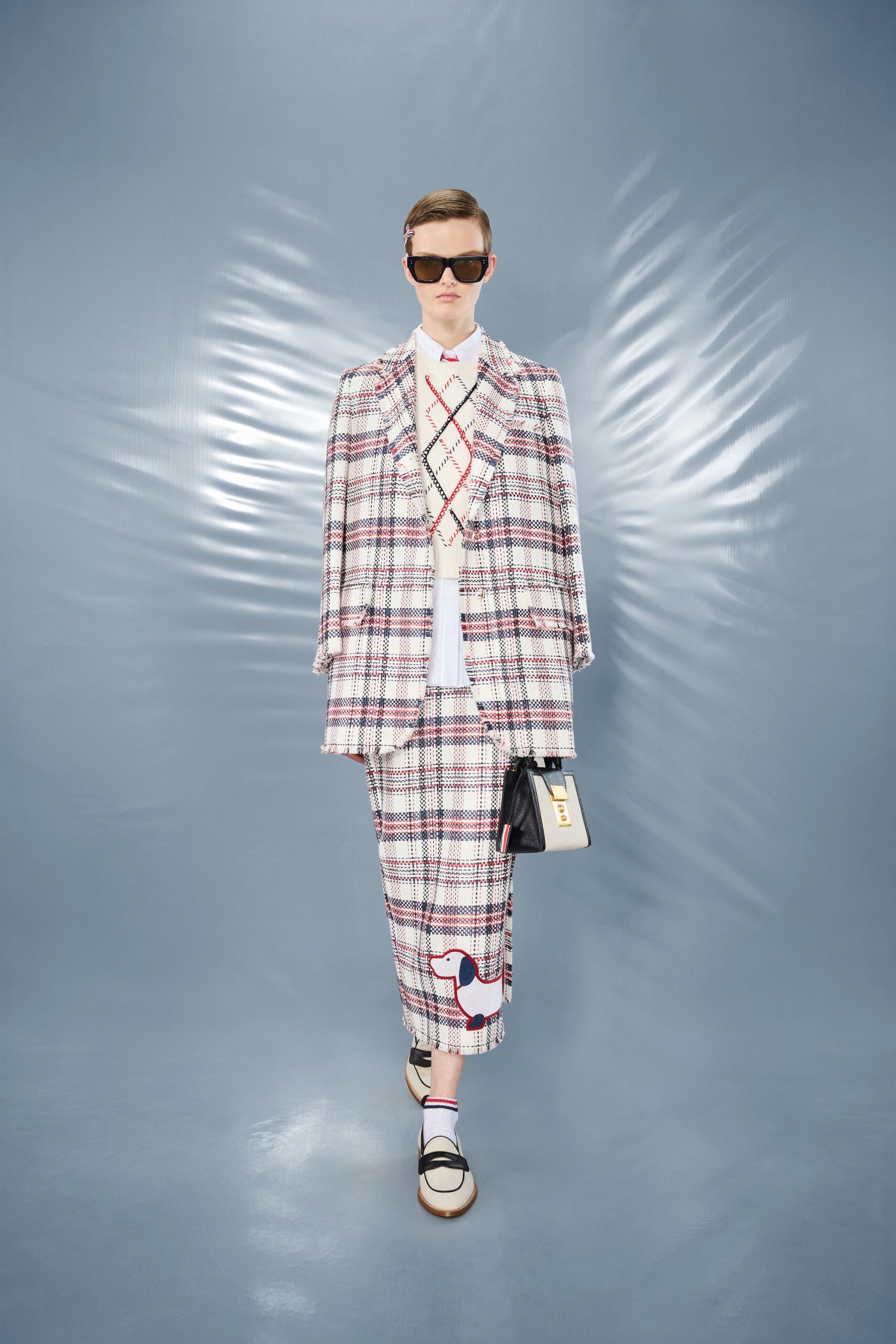 checked tailored suit with sunglasses