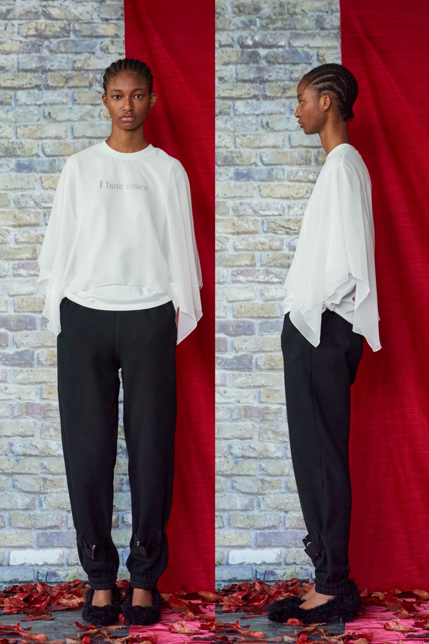 white relaxed top with black pants