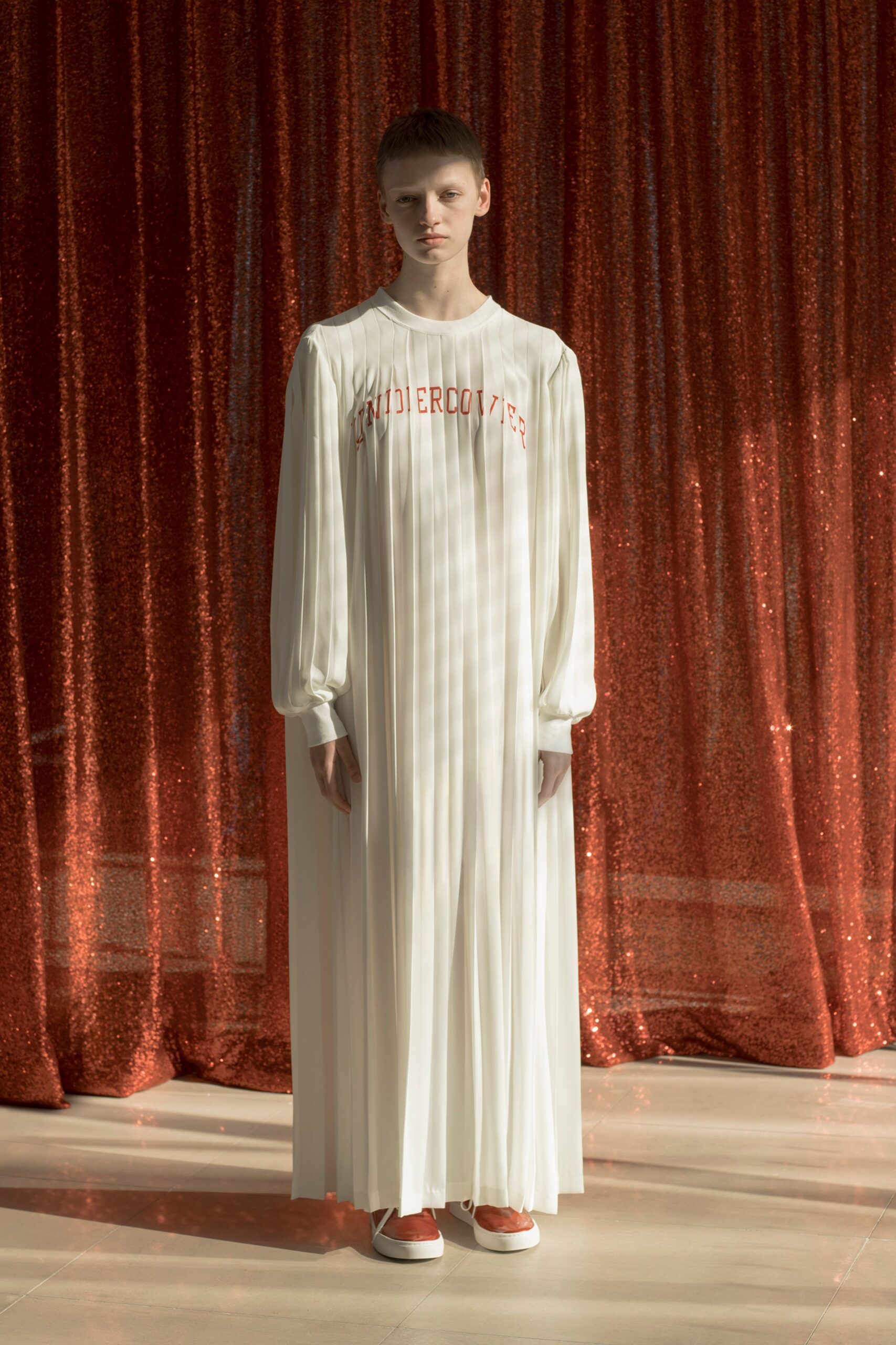 white pleated maxi dress with red shoes