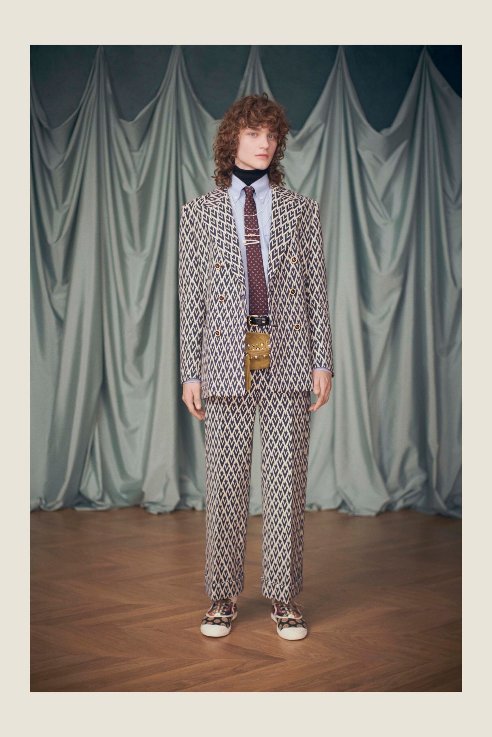 beige tailored suit with white shirt