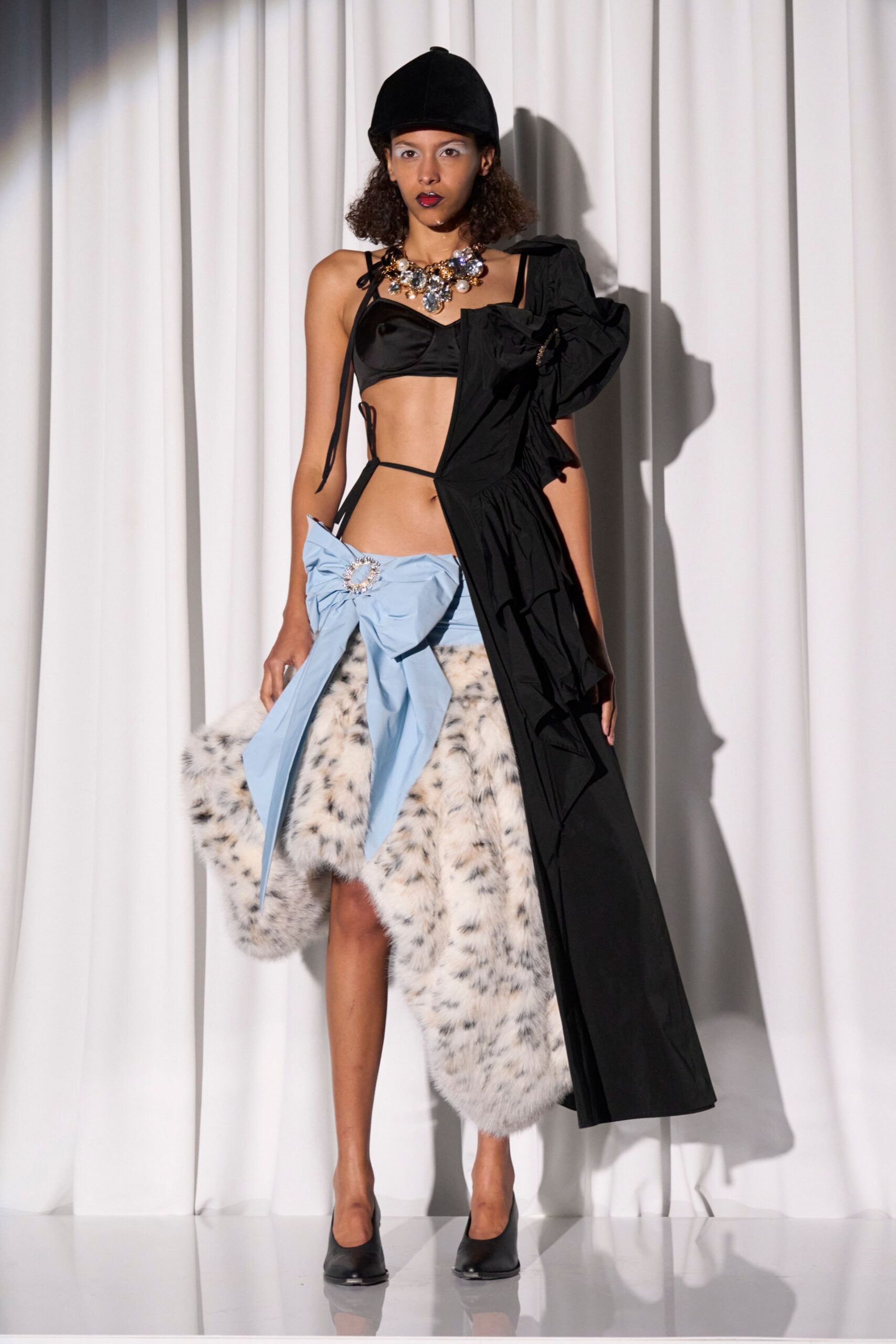 black leather top with fur skirt