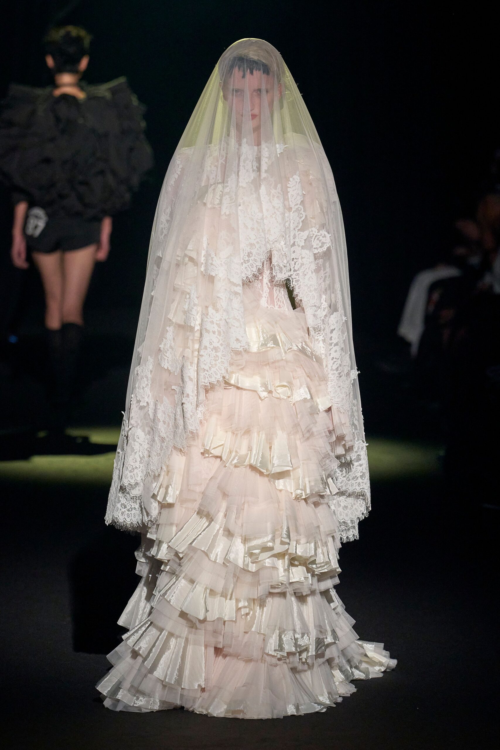 pink ruffled gown with veil