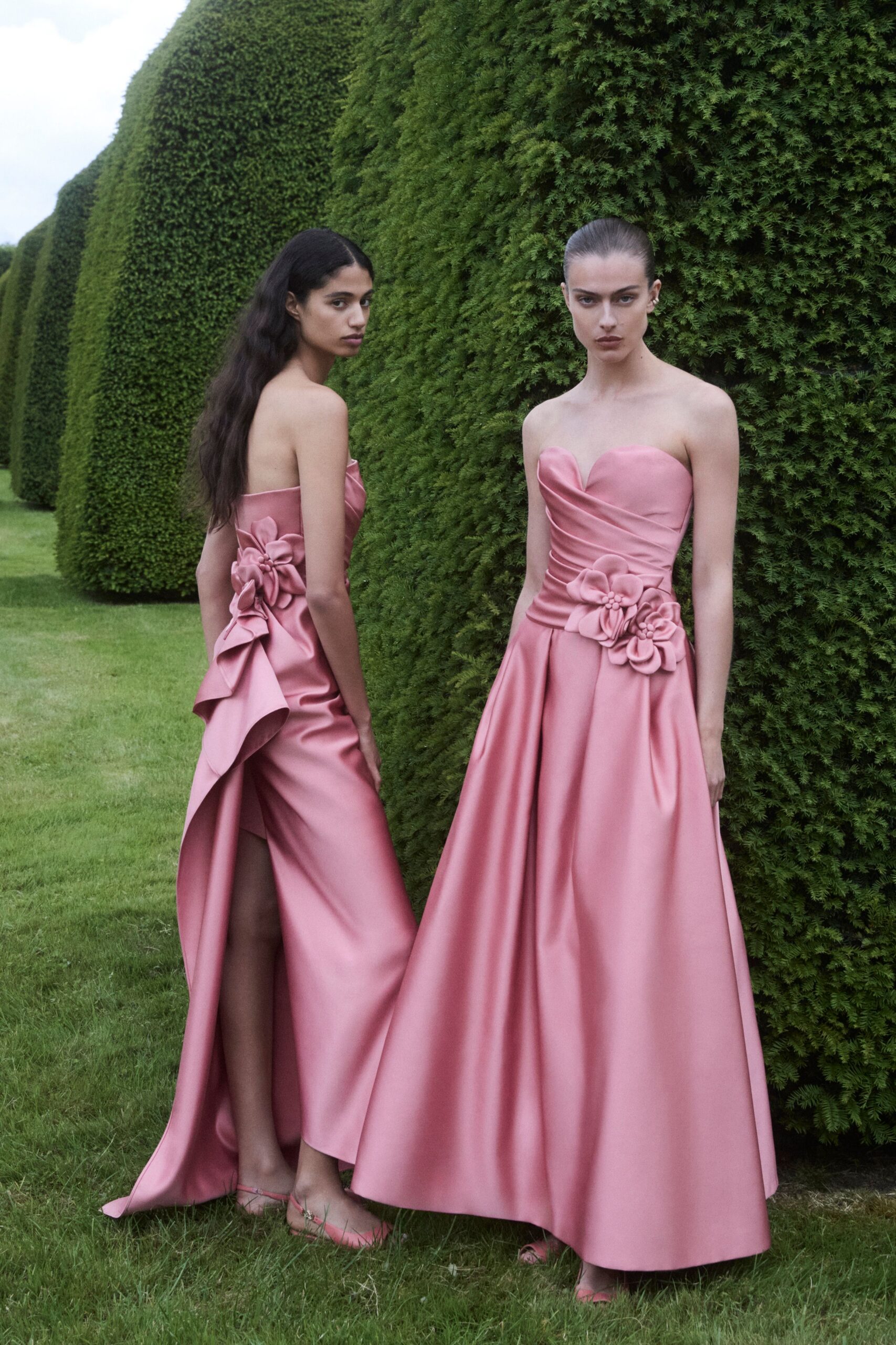 pink satin strapless fitted draped flared maxi gown
