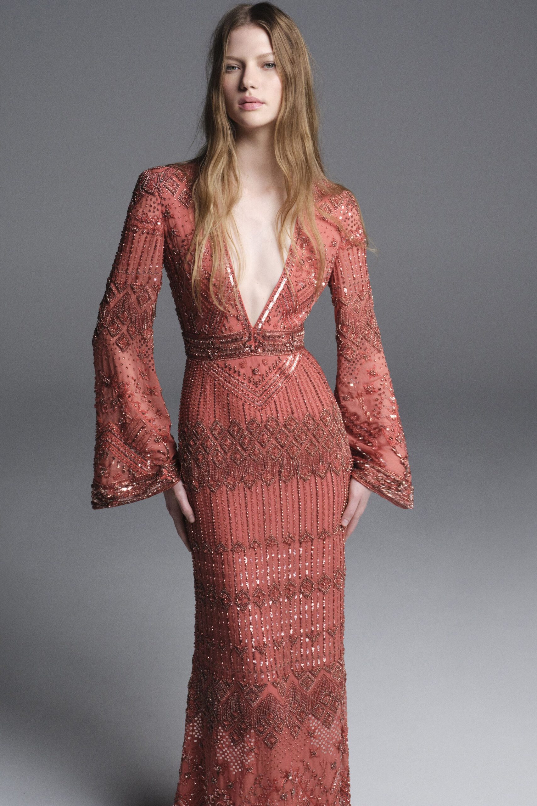 coral beaded long-sleeve gown