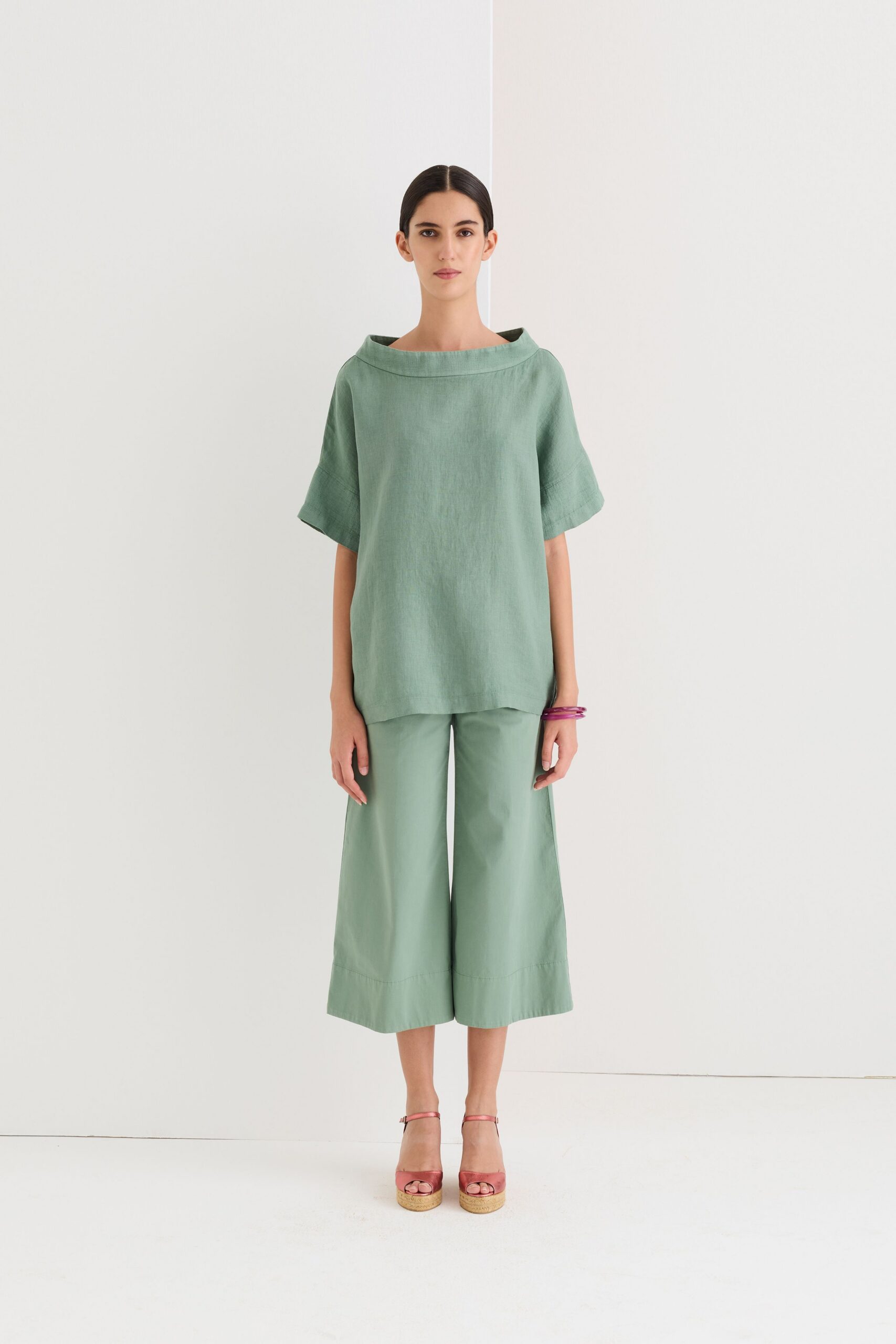 green linen top and wide-leg pants