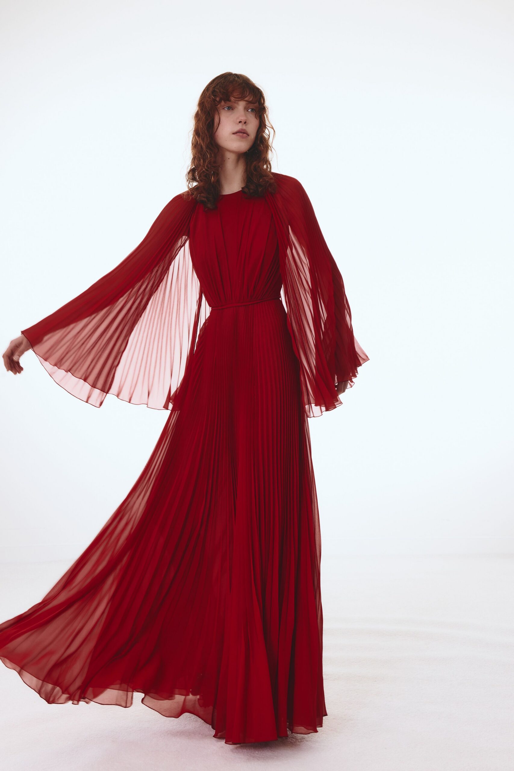 red chiffon pleated gown