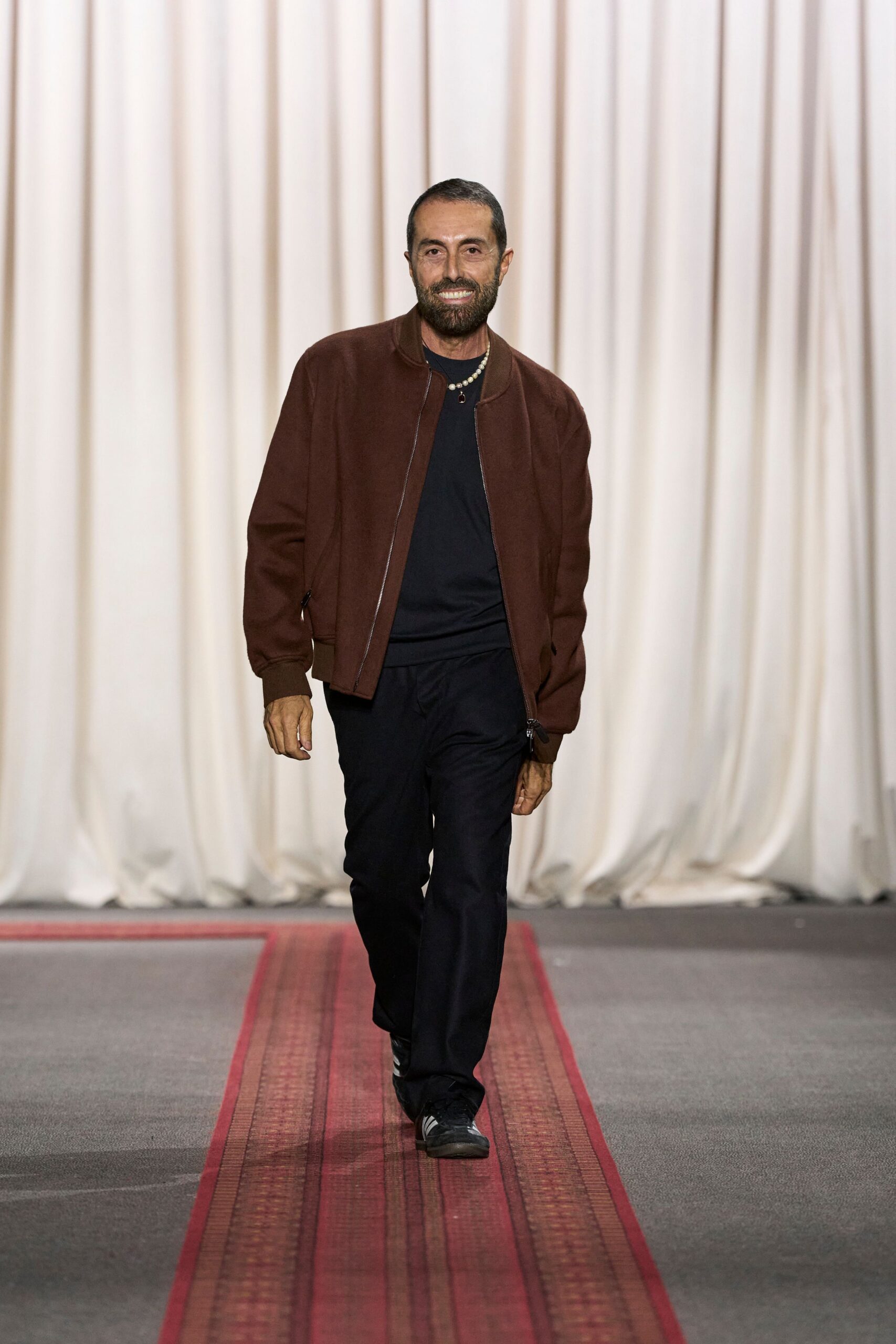 brown leather jacket with black t-shirt and pants