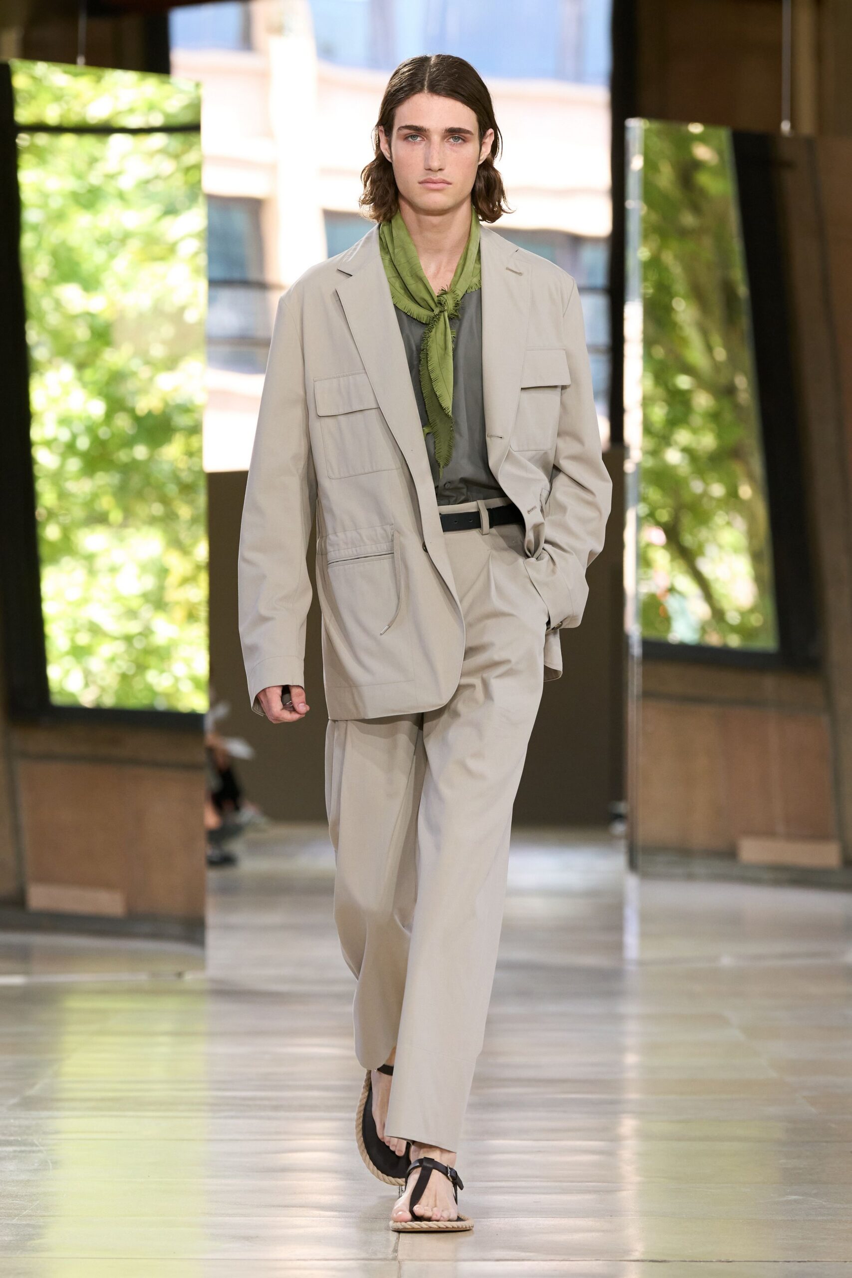 beige relaxed suit with green scarf