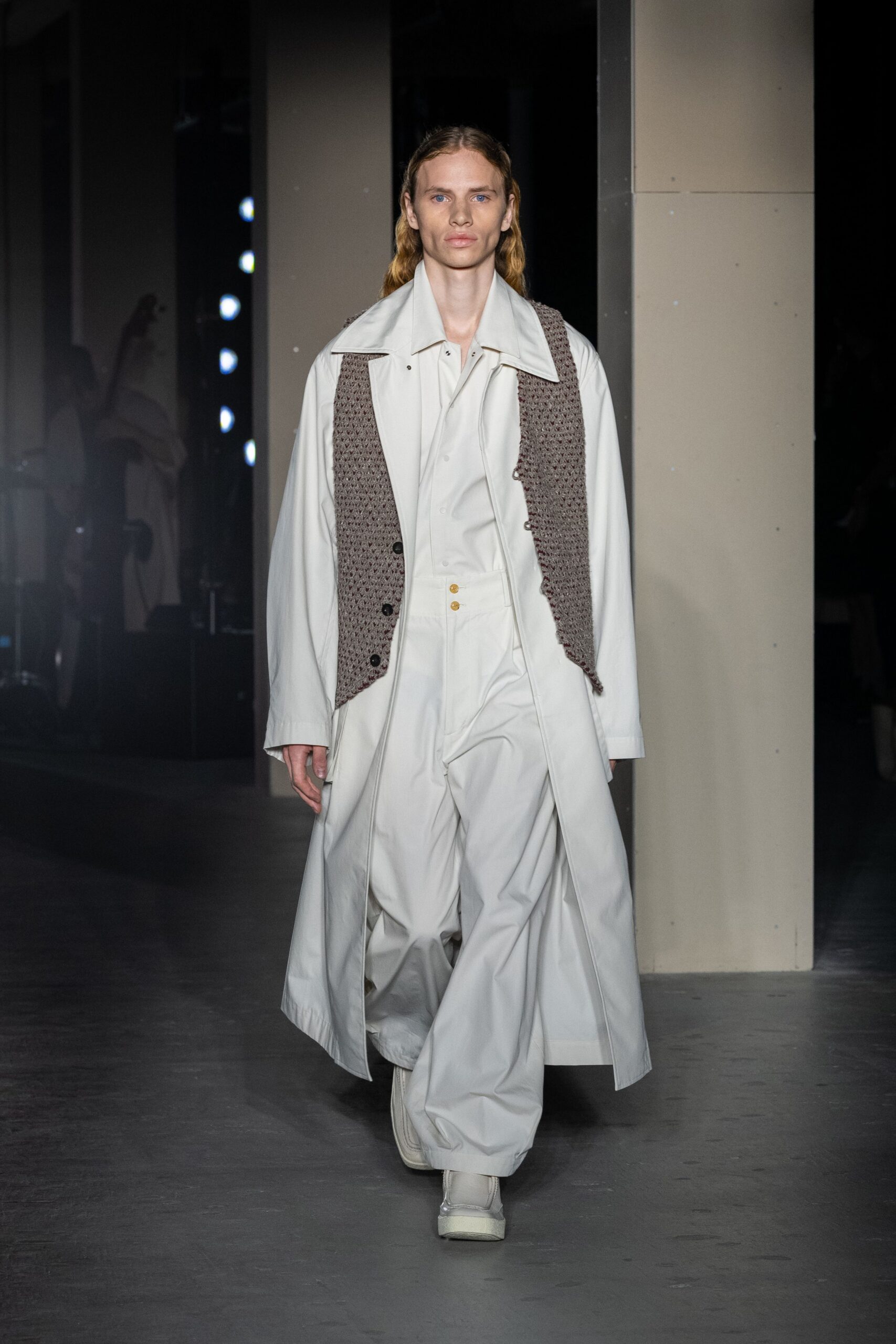 white coat with brown vest