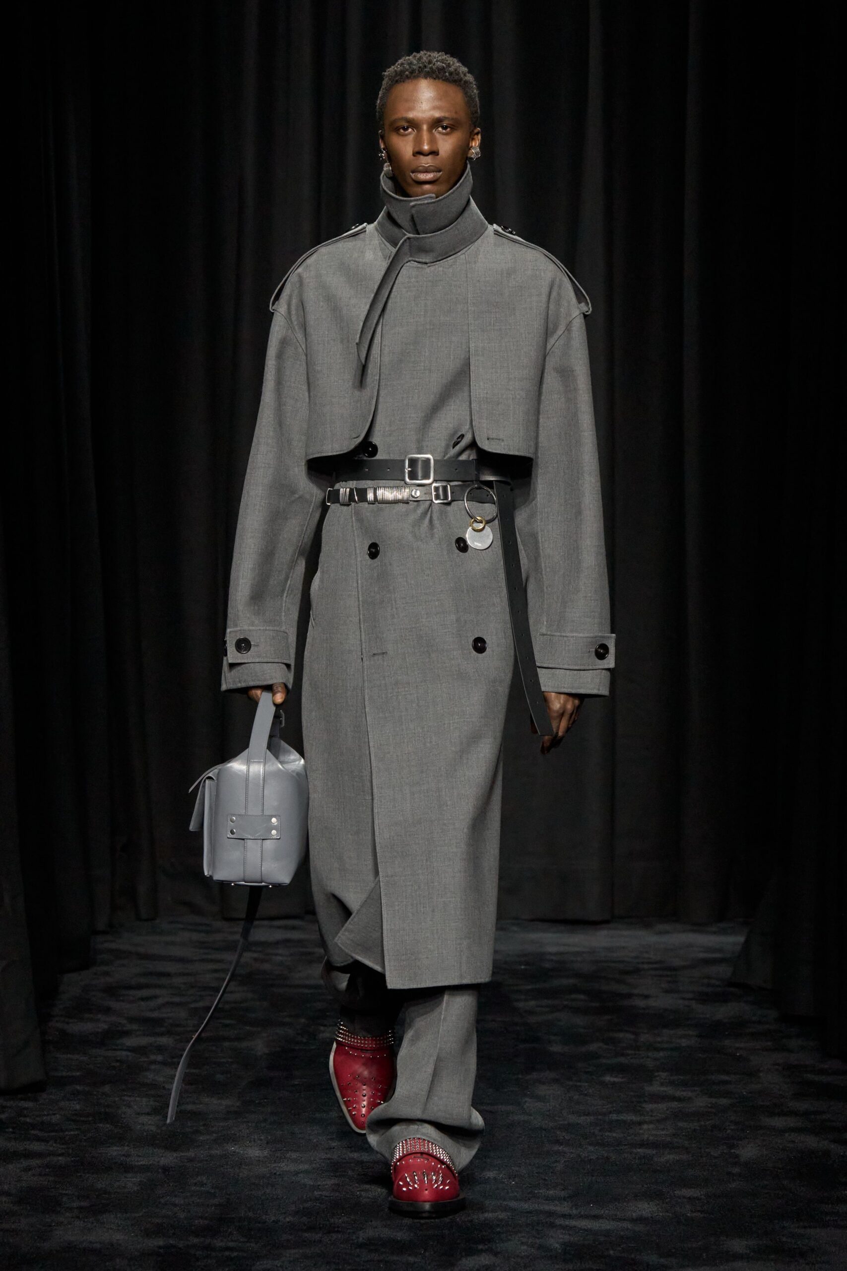 gray wool coat with red shoes