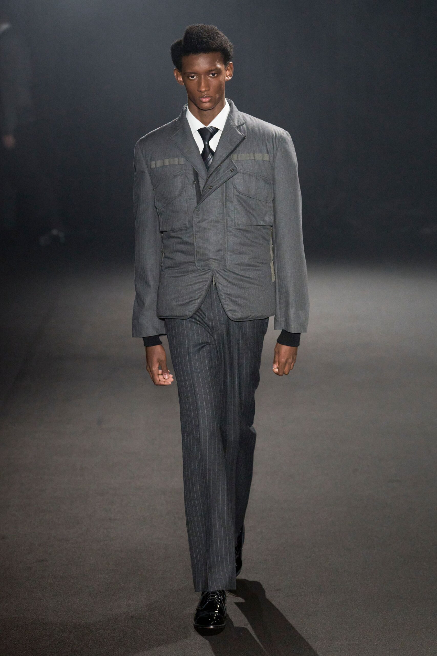 gray tailored suit with black shoes