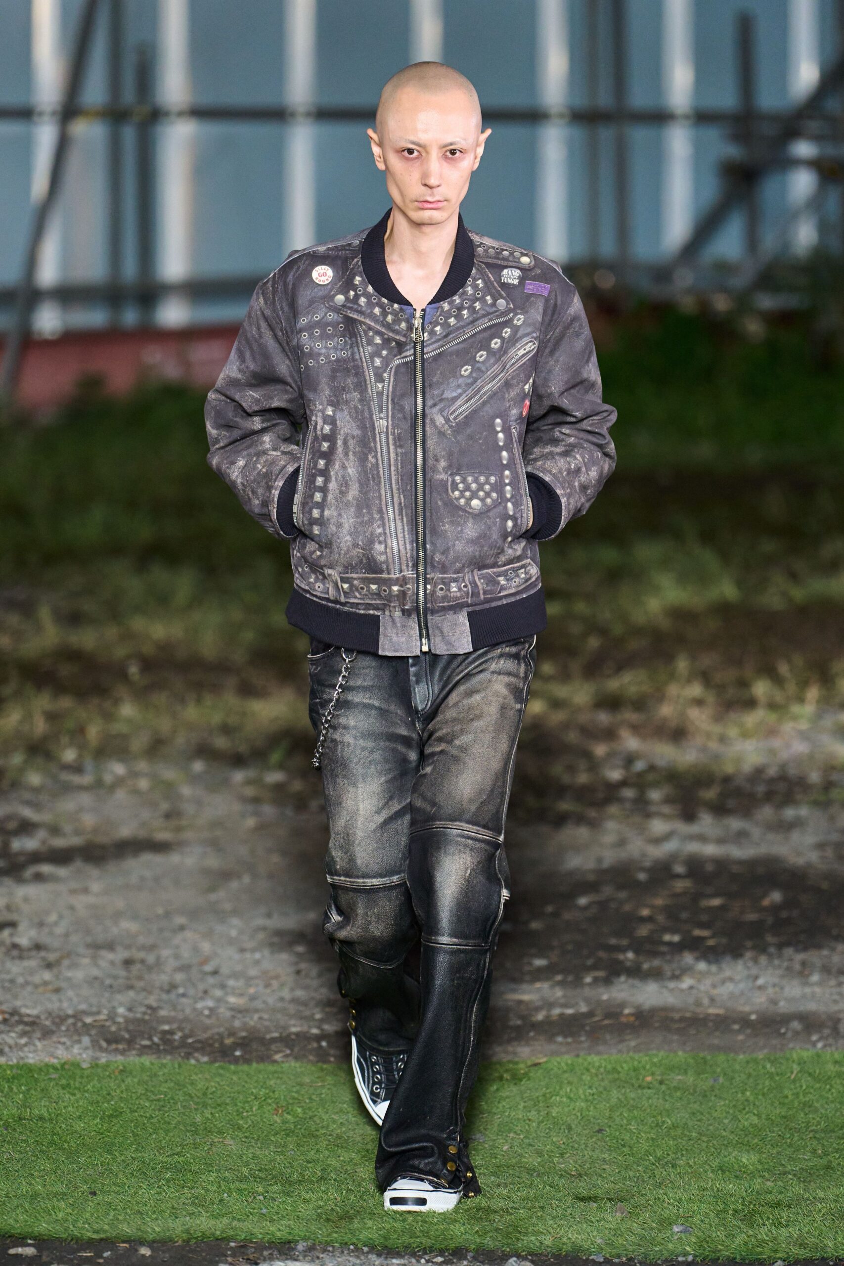 black denim jacket with distressed pants