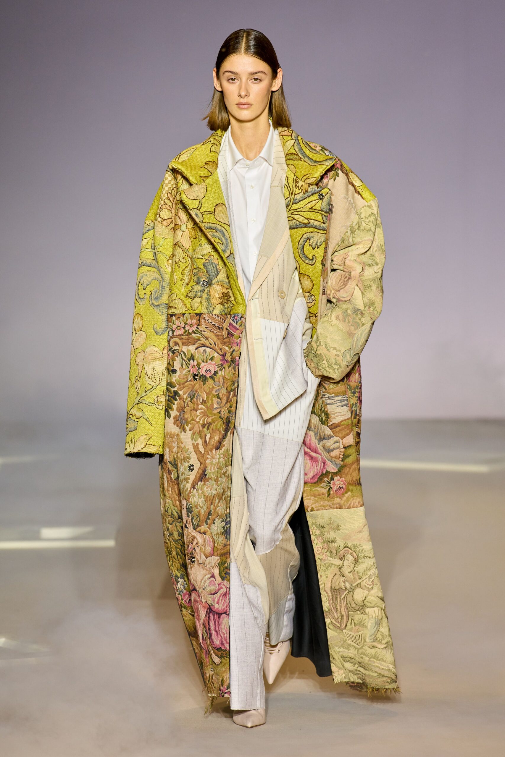 embroidered yellow coat with white shirt