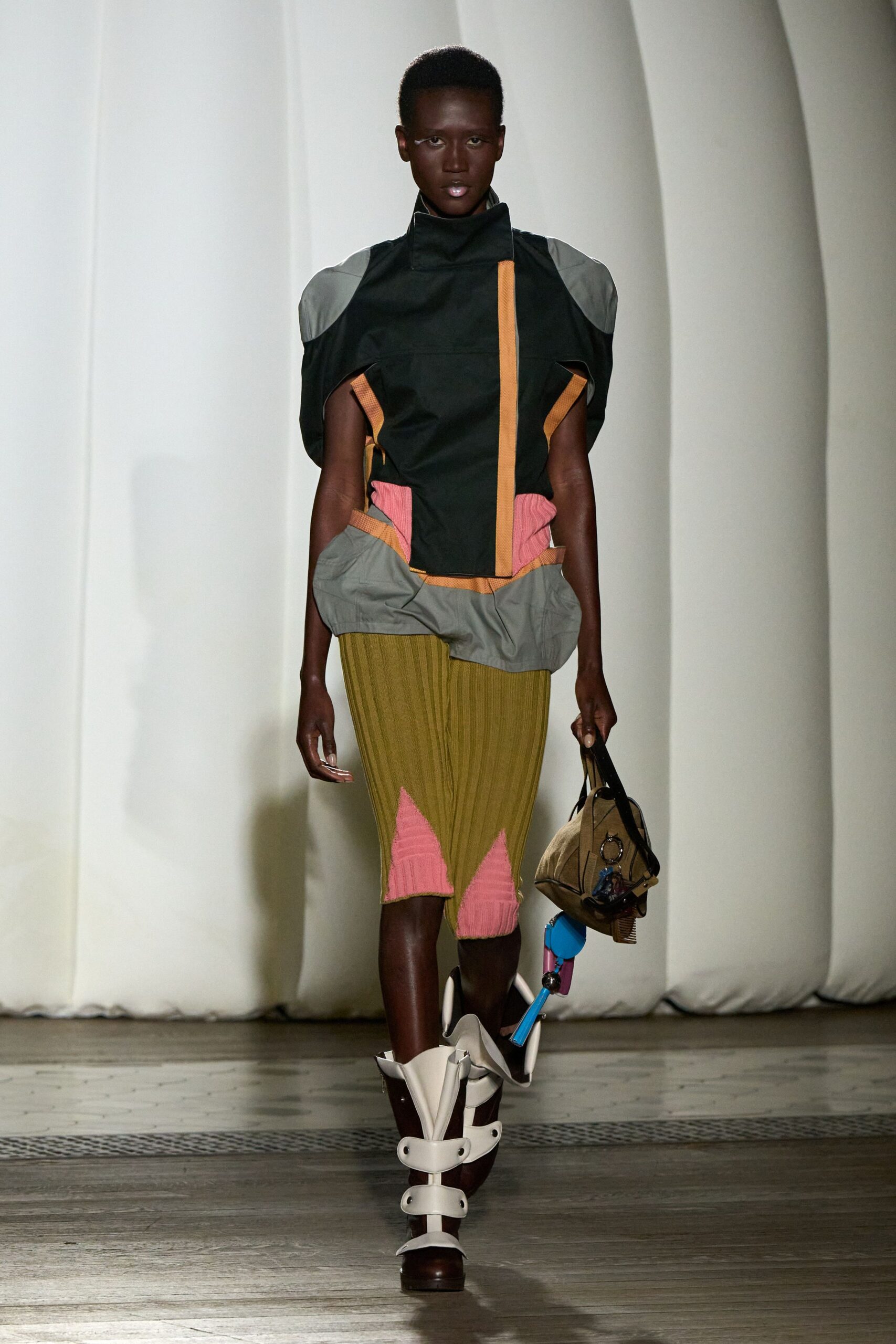 black green orange fitted top with yellow skirt