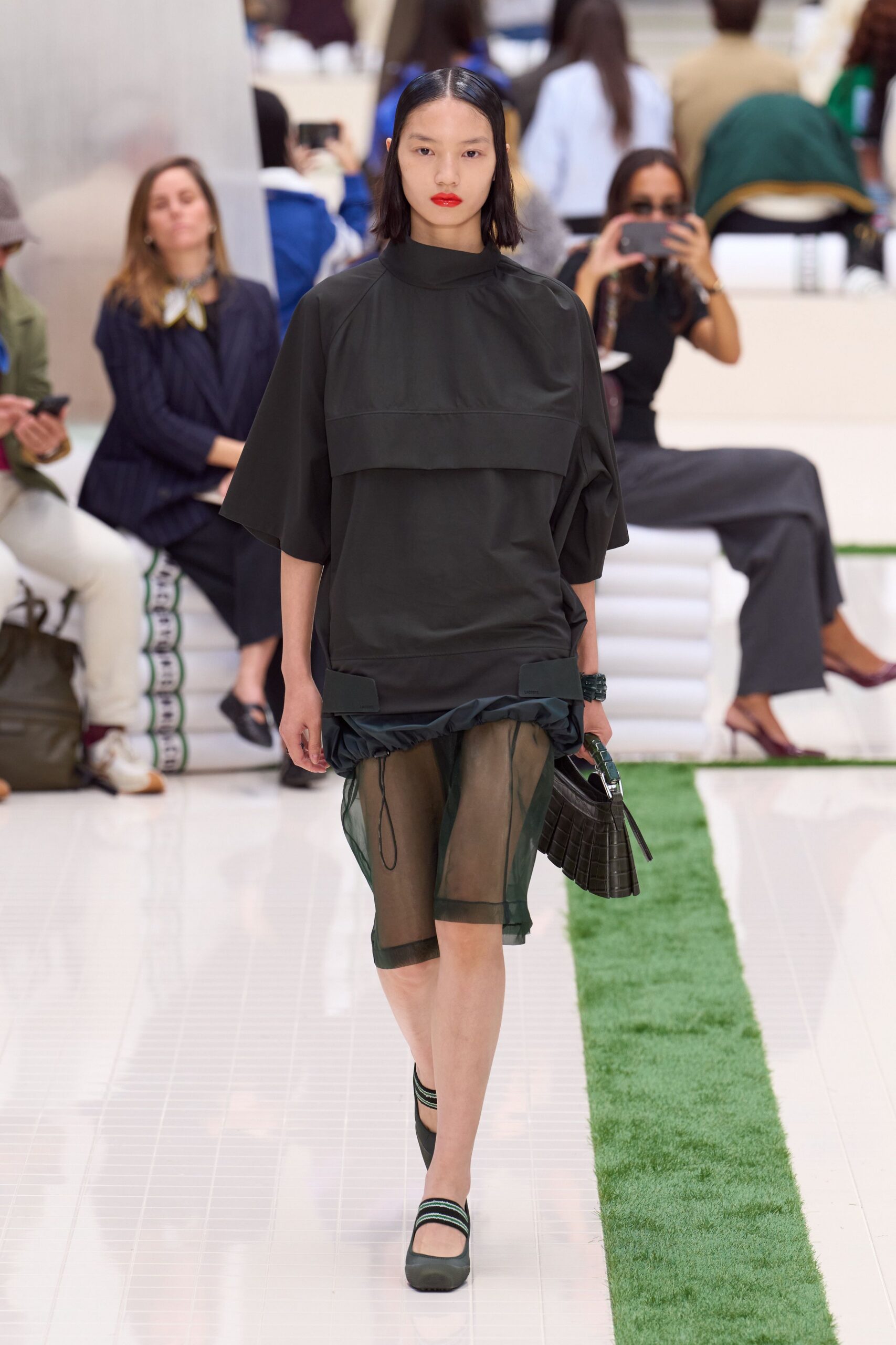 black relaxed top with sheer skirt