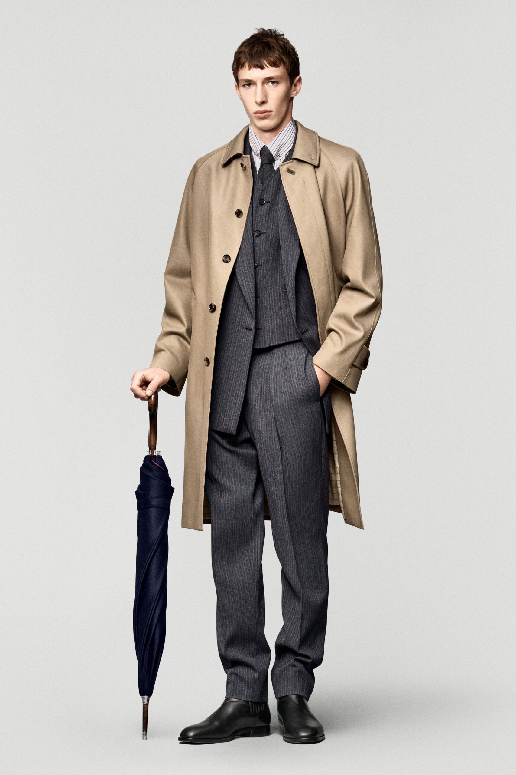 beige wool long-sleeve collared relaxed buttoned coat