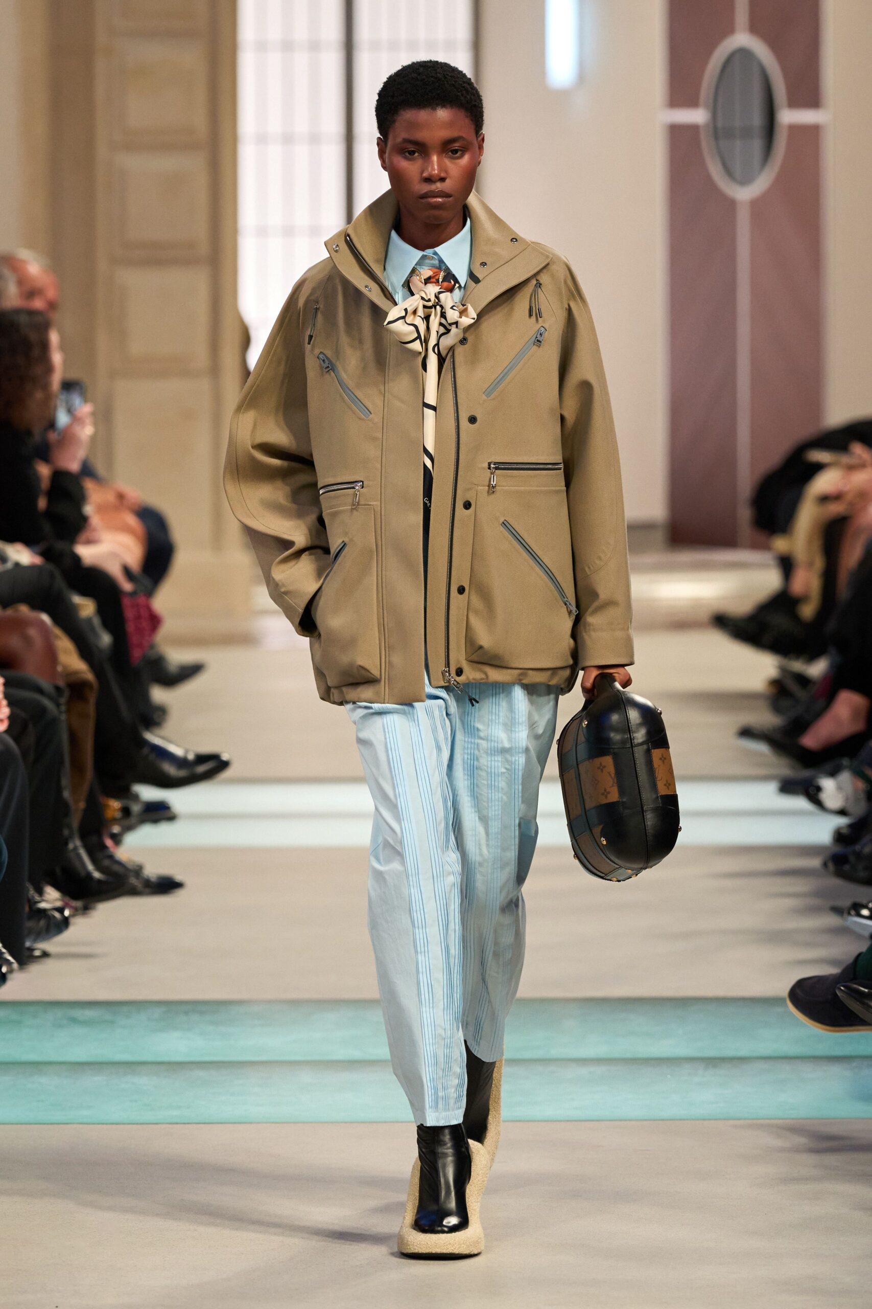 beige relaxed jacket with blue shirt