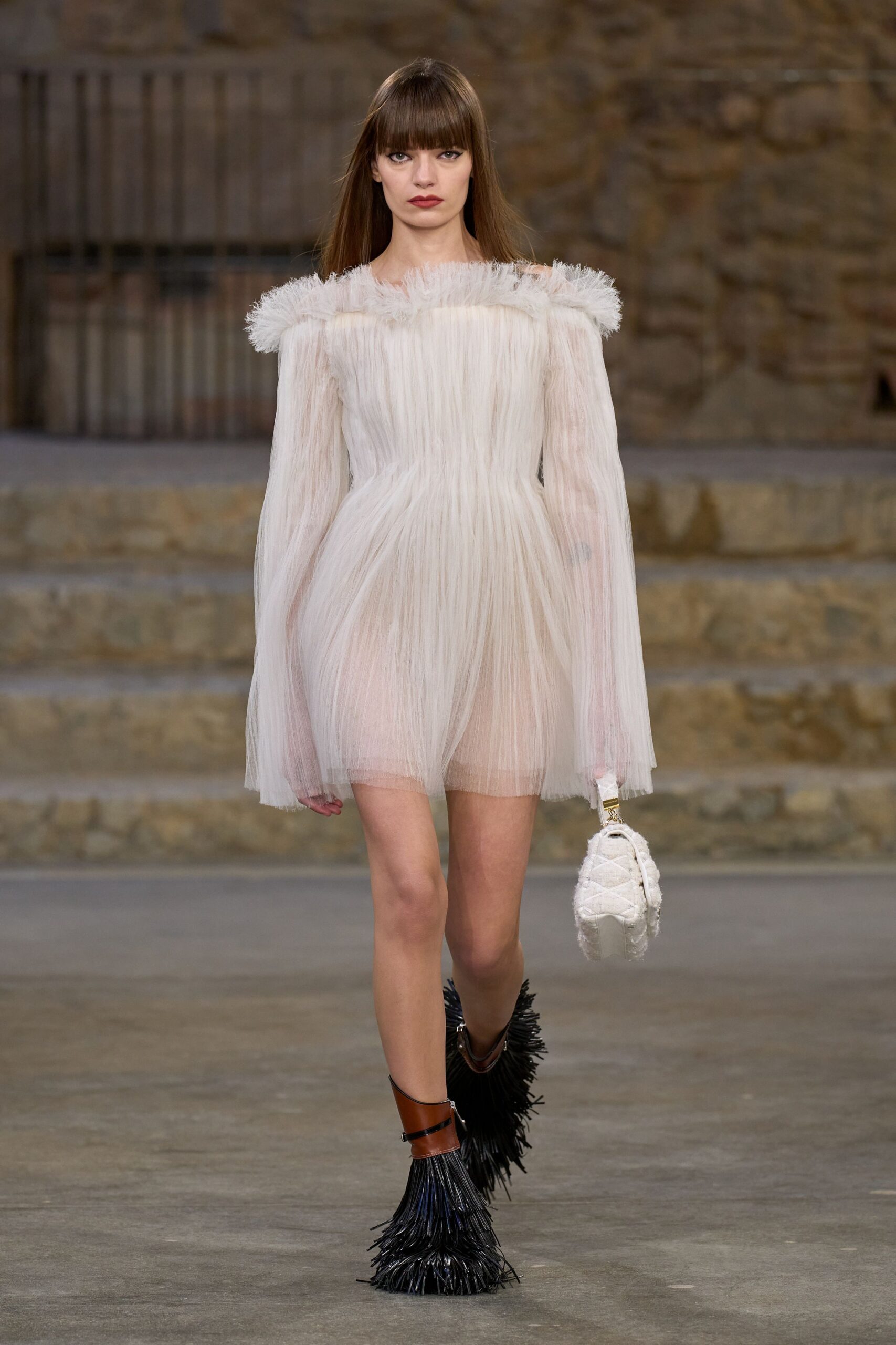white tulle long-sleeve off-shoulder fitted pleated flowing dress