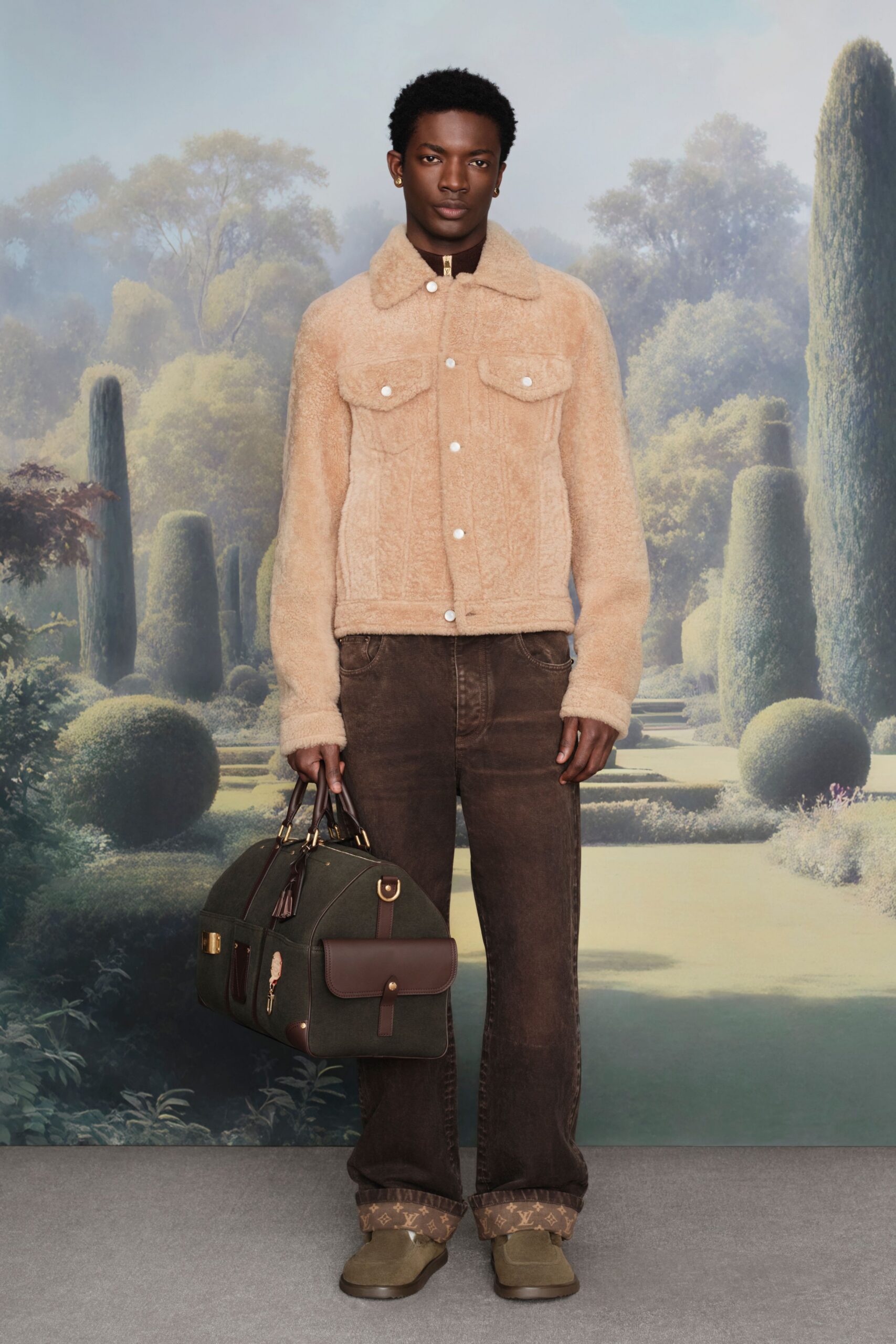 beige faux-fur jacket with brown denim pants