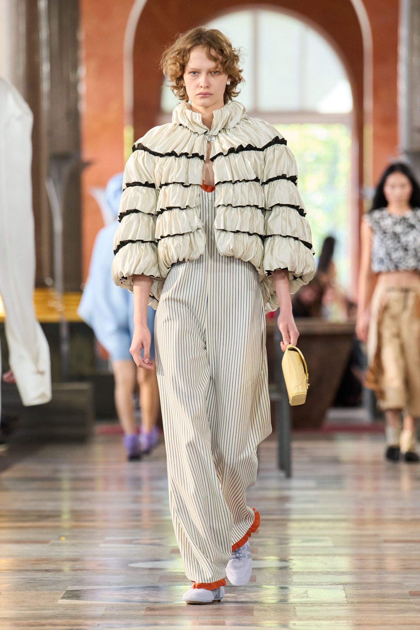 white padded jacket with striped pants