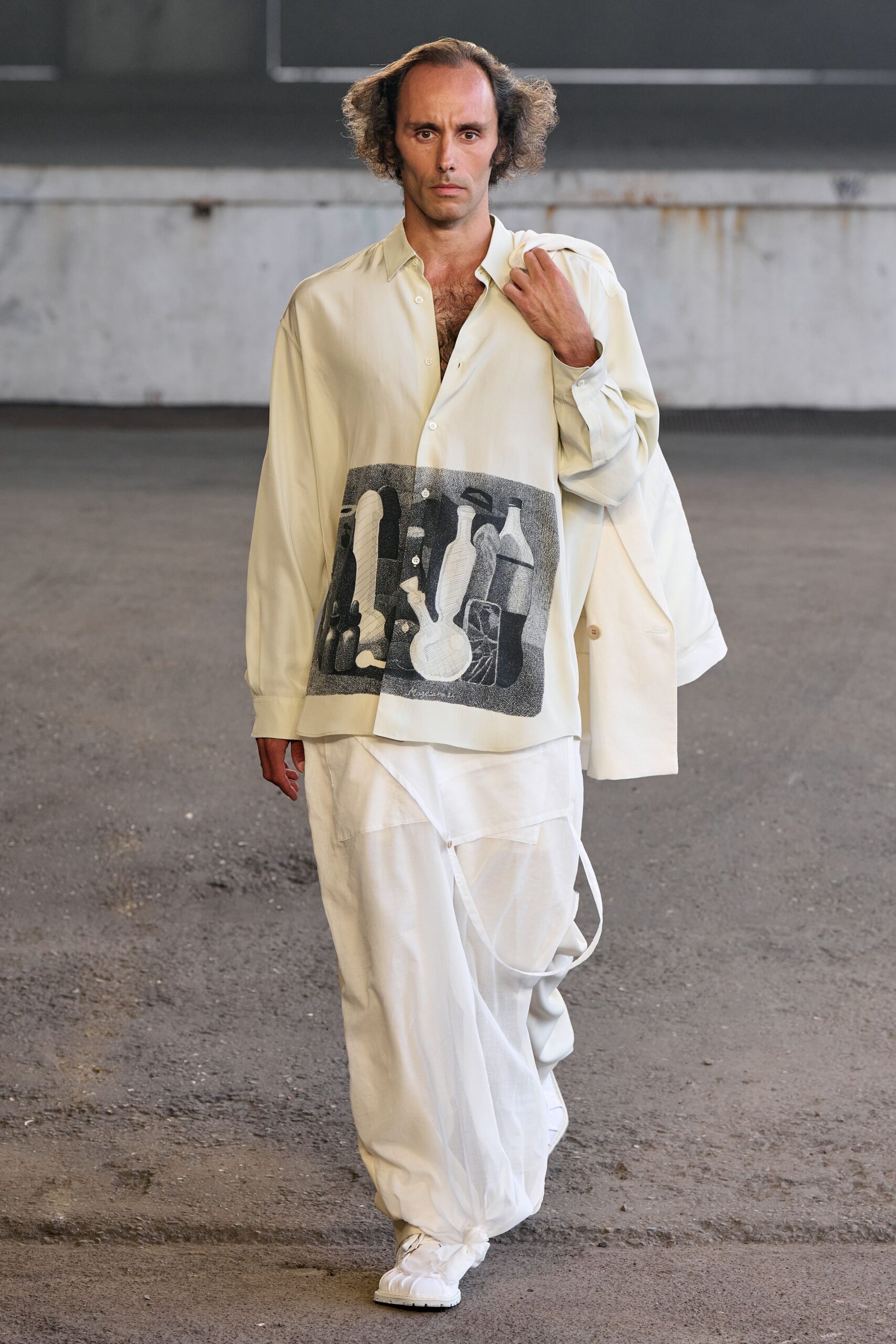 white relaxed shirt and pants