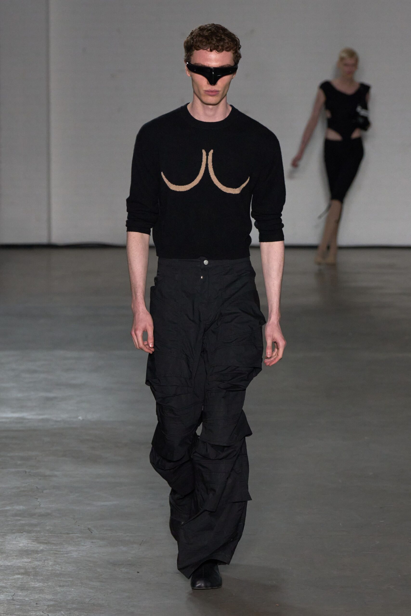black fitted top with cargo pants