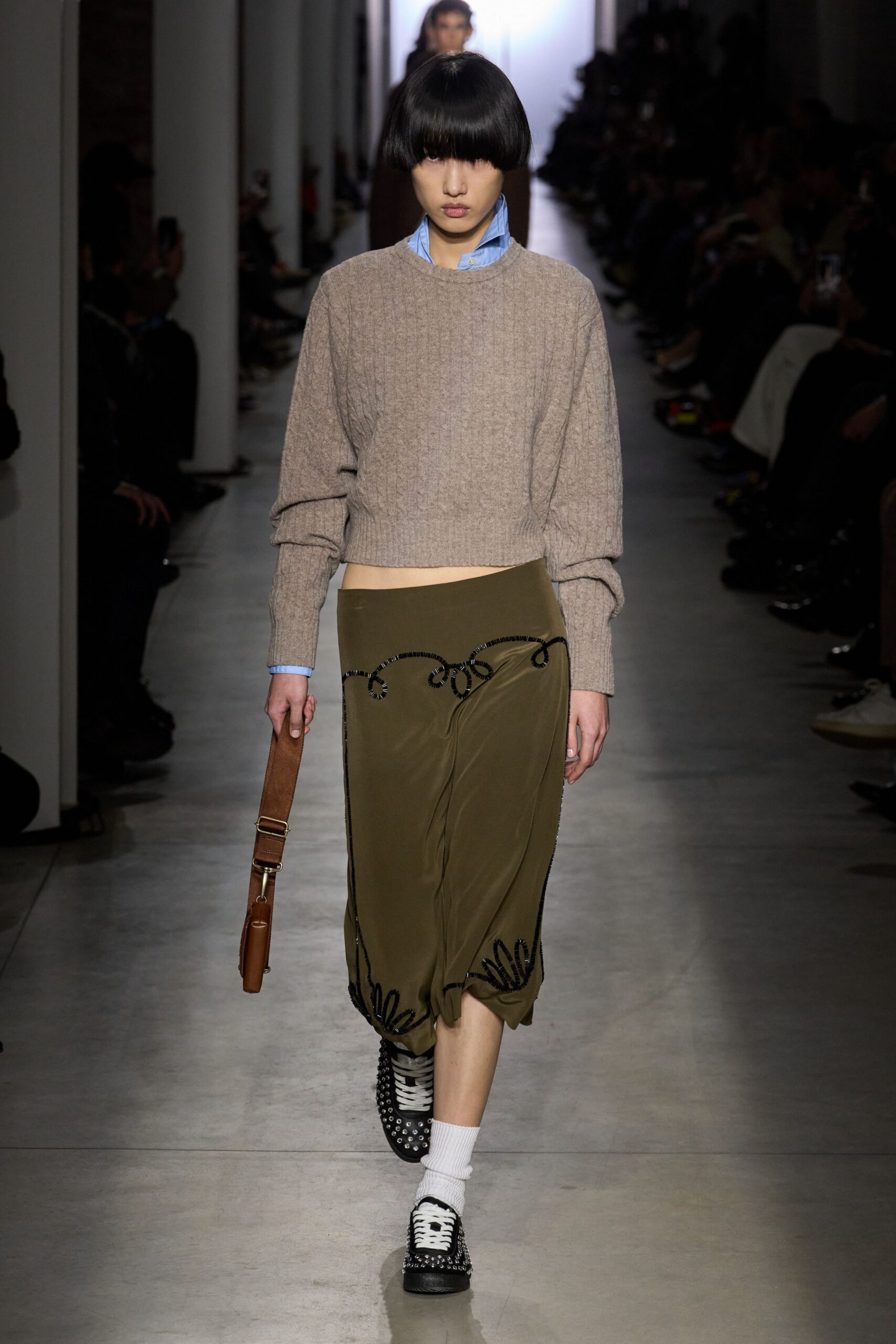 beige wool sweater green embroidered skirt